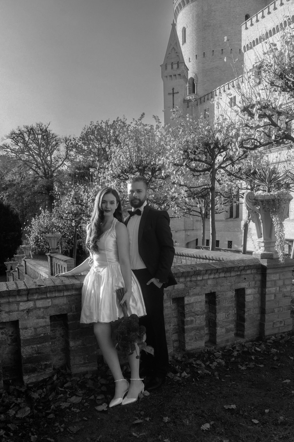 Photo of a couple outside at their wedding