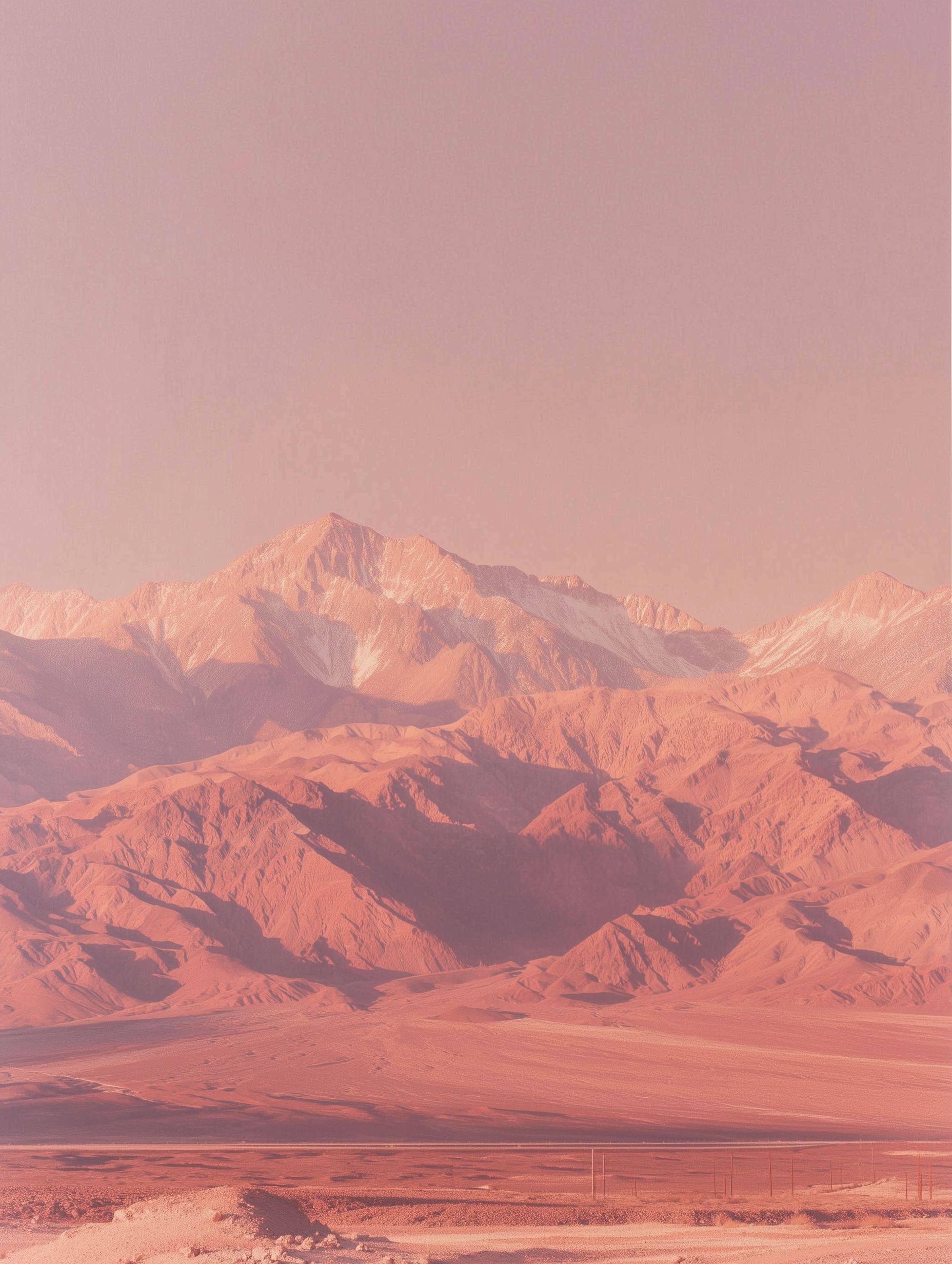 Desert landscape with mountain and pink sky gradient