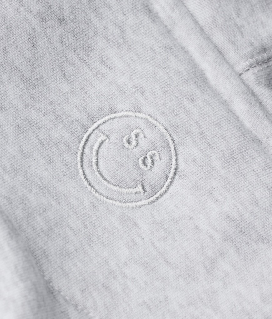 Sunday Superior tonal smiley embroidery on light grey fabric