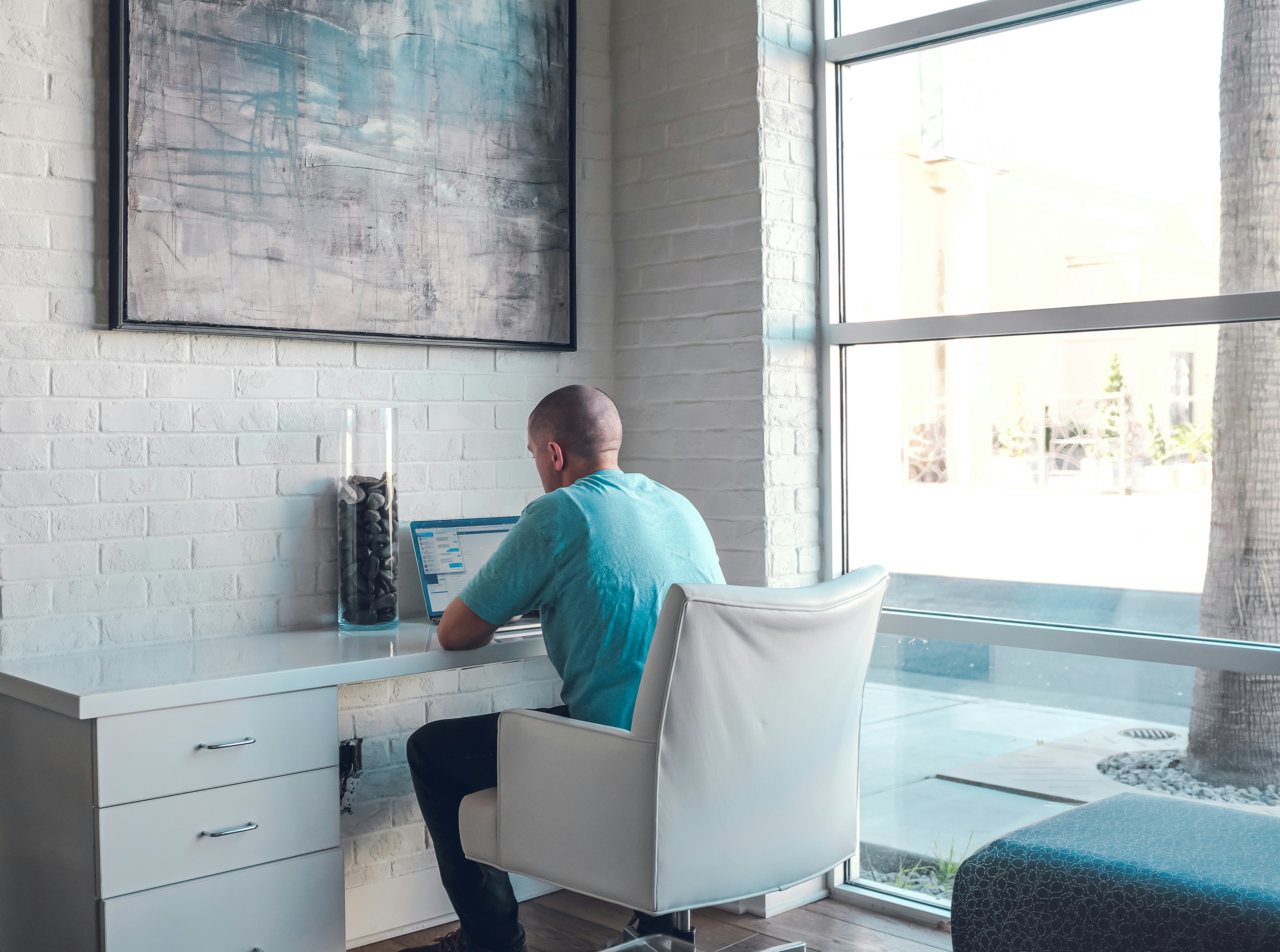 student working from his home on First Person Essay