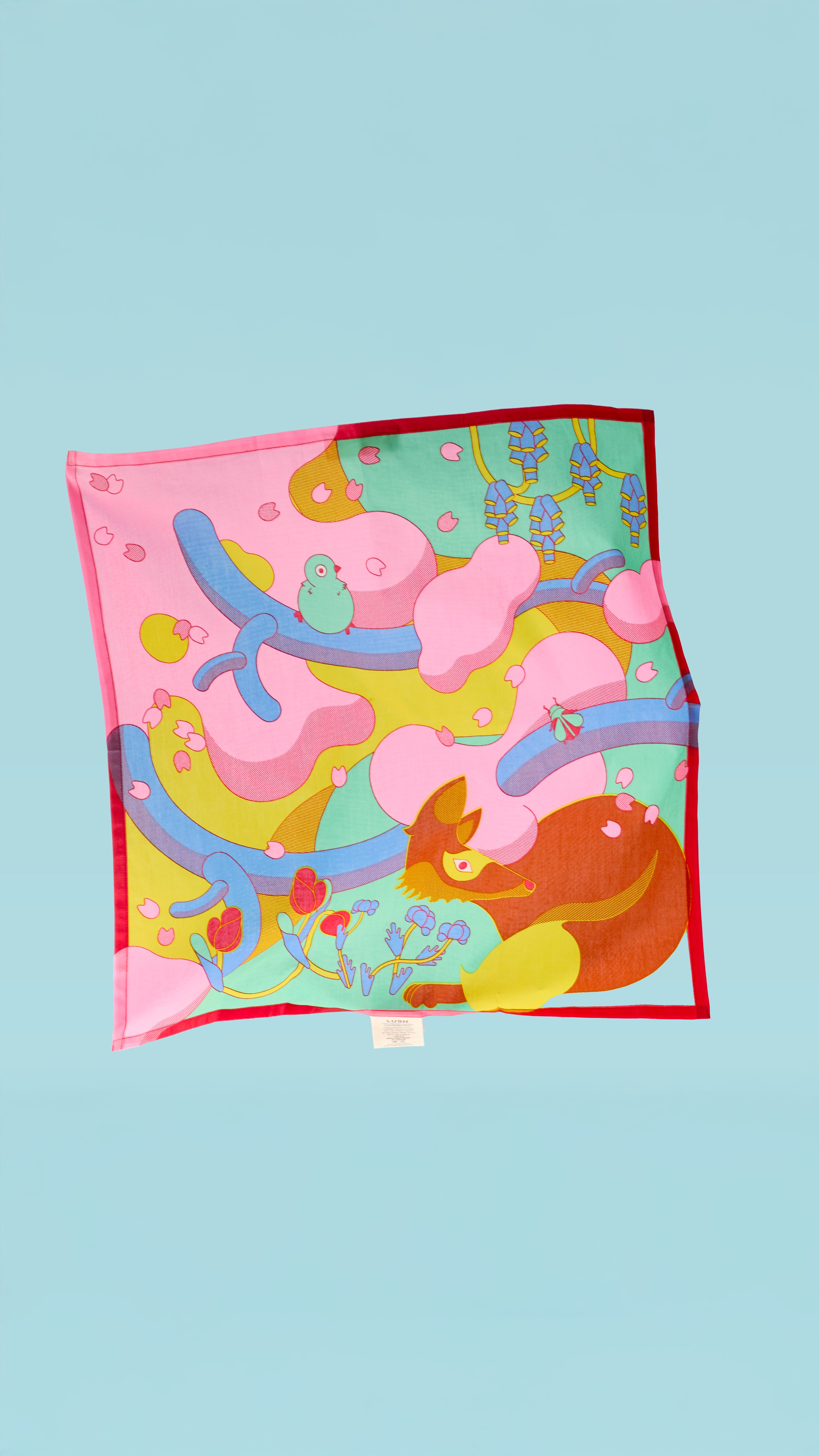 Lineup of four Tales of Uji tea cans with different illustrated labels.