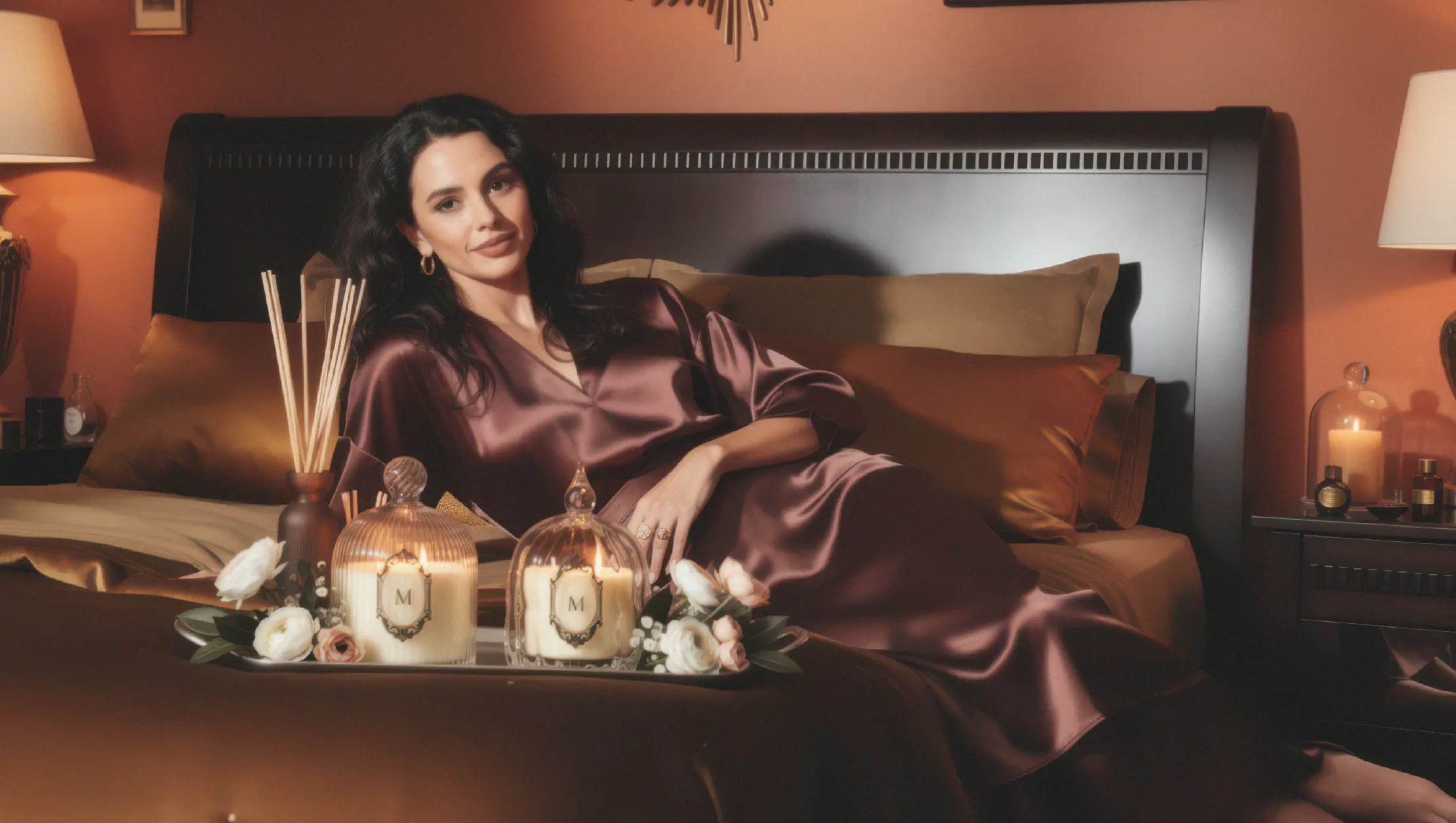 Lifestyle photography showing Maison Petal luxury candle products in branded interior setting