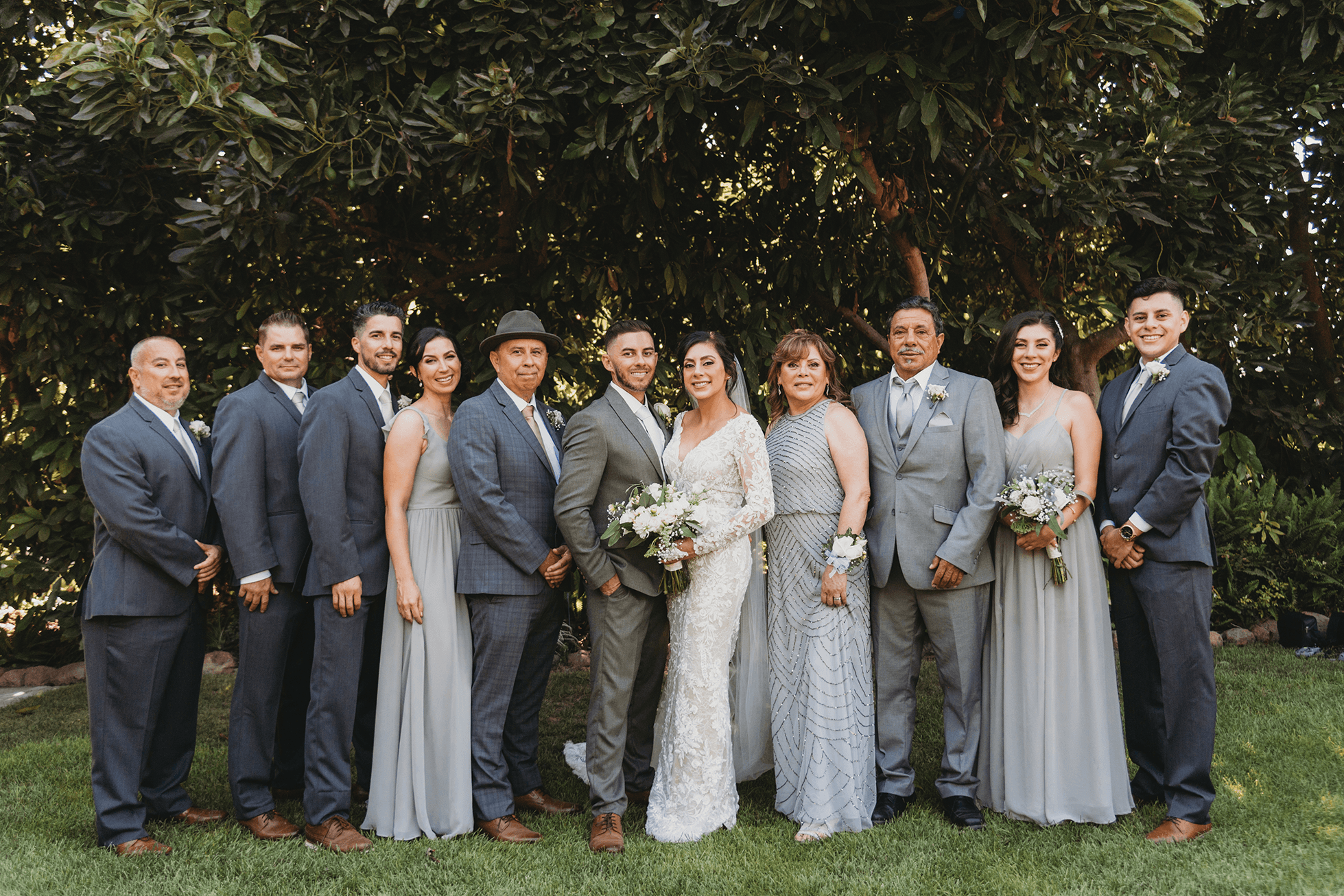 Flat lay wedding details with bouquet, rings, and sparkling bridal heels