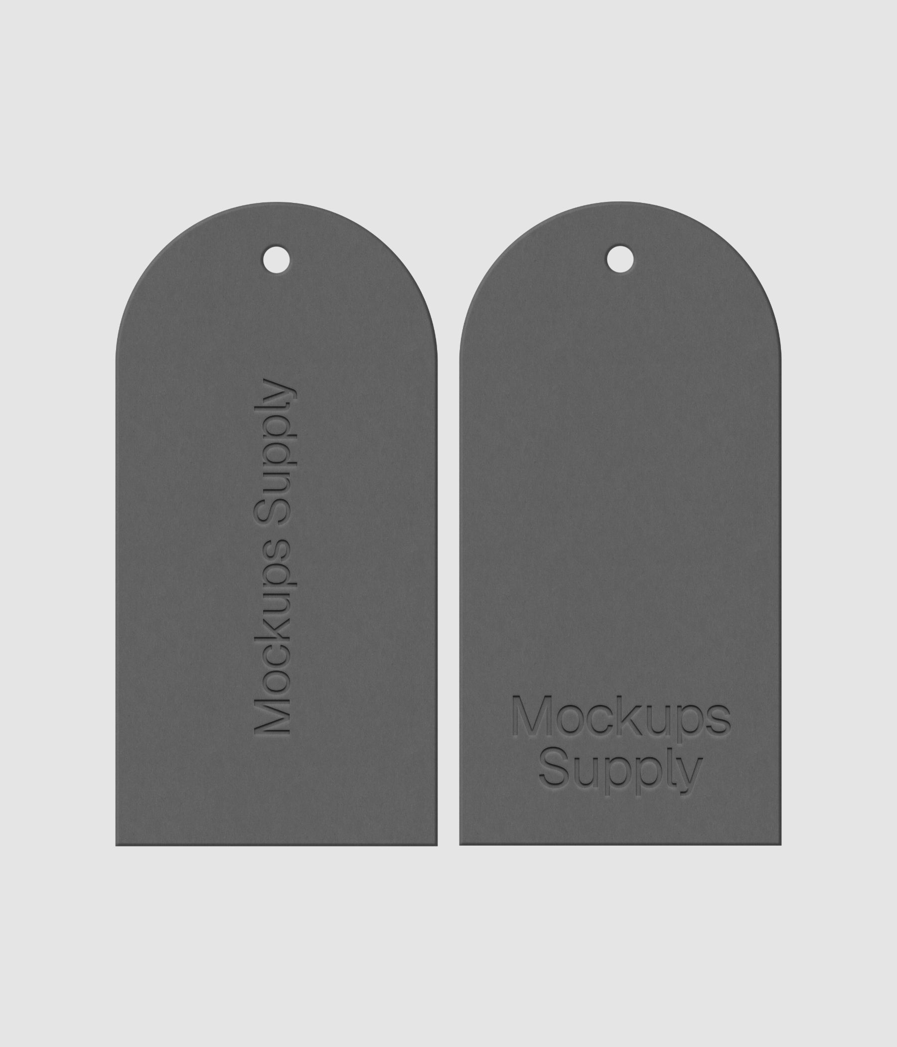 Pair of white arched top clothing tags featuring embossed branding on dark surface with customizable design for fashion collection mockup