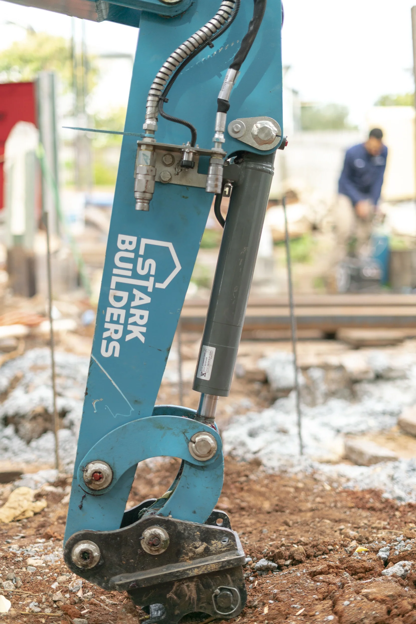 Stark Builders excavator on site during a Brisbane renovation