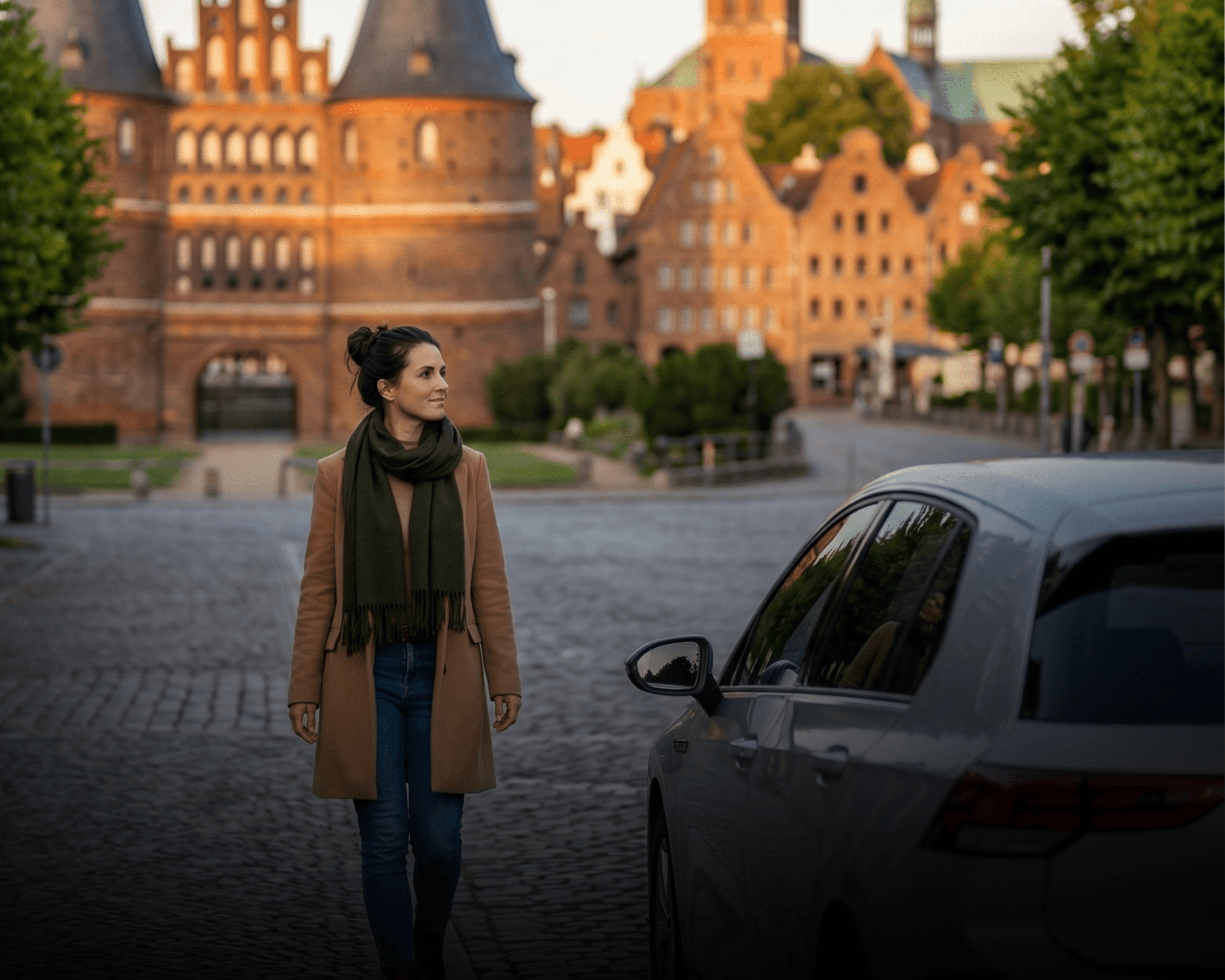 two people looking at a tablet and smiling