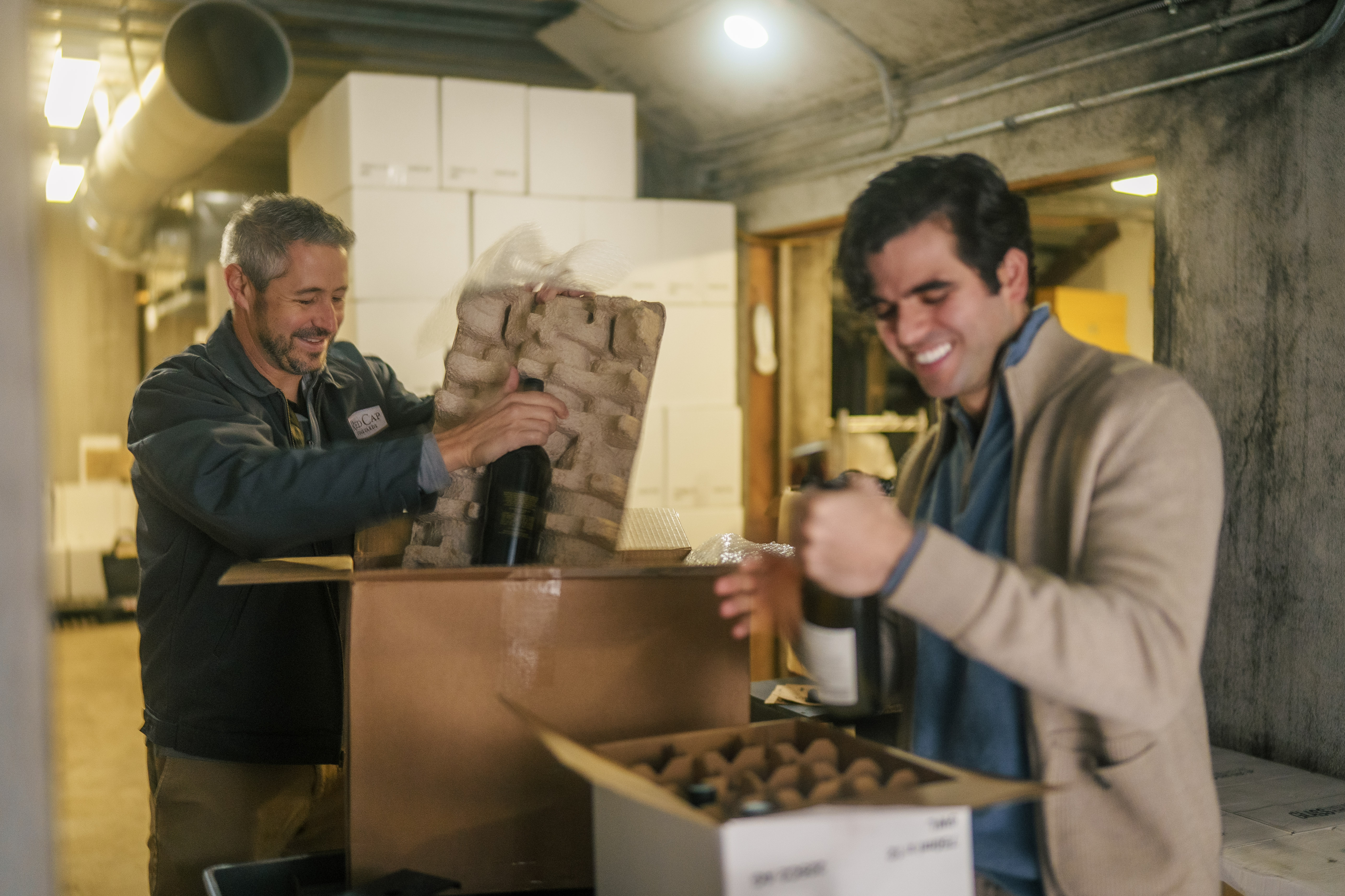 People shown alongside Loya visuals after payment, indicating cashback rewards that can be used on future purchases.