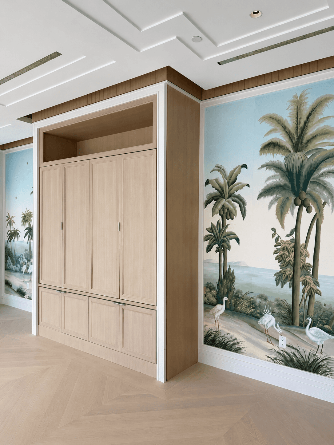 Modern spa interior with product displays, flowing curtains, and large windows showing greenery.