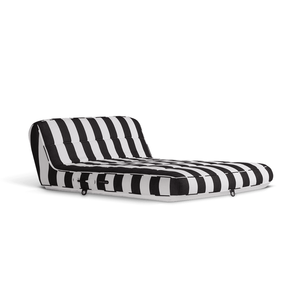 Luxury double pool float in black-and-white stripe canvas with progressive shading and matte white base