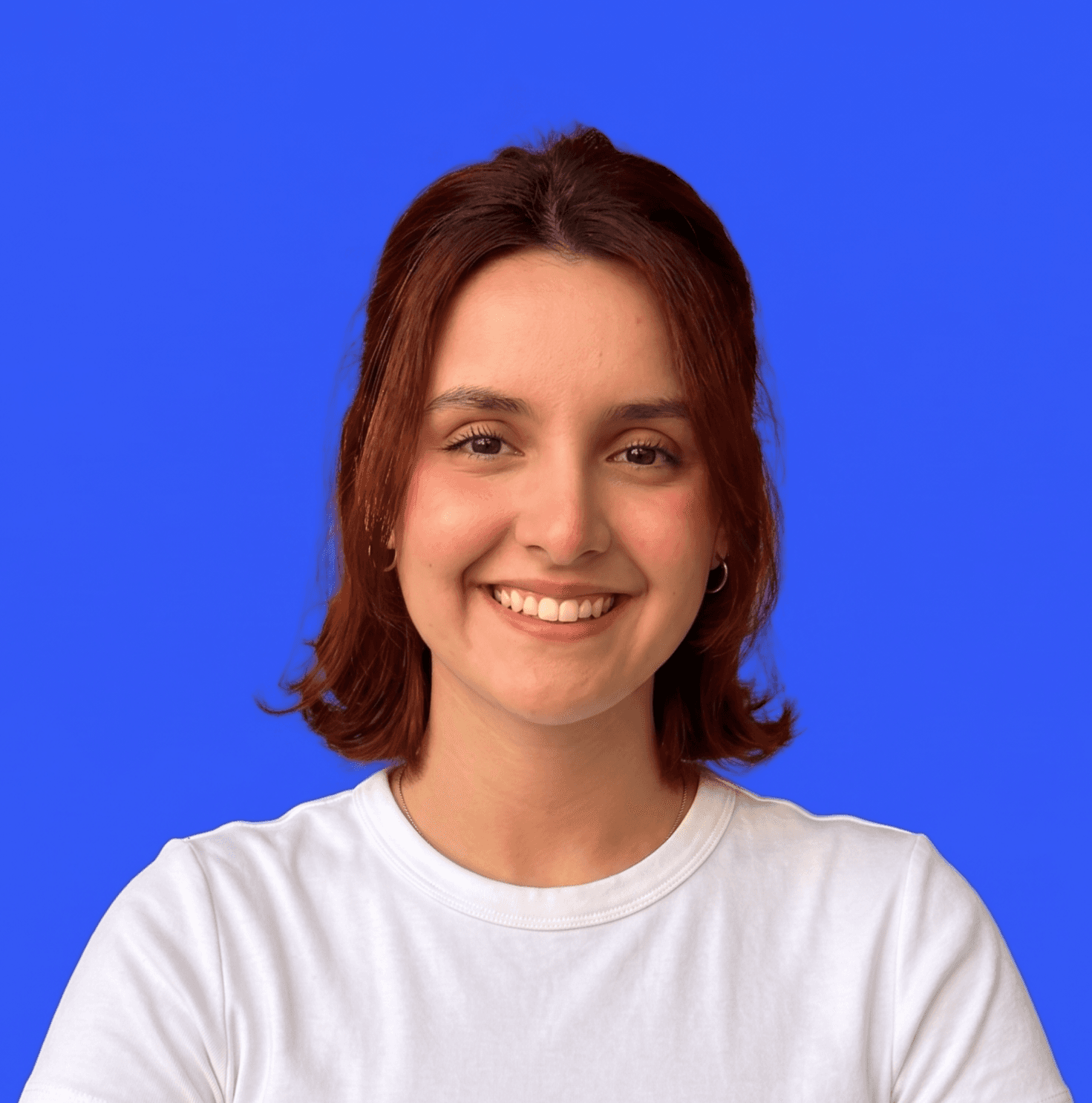 woman in white shirt smiling