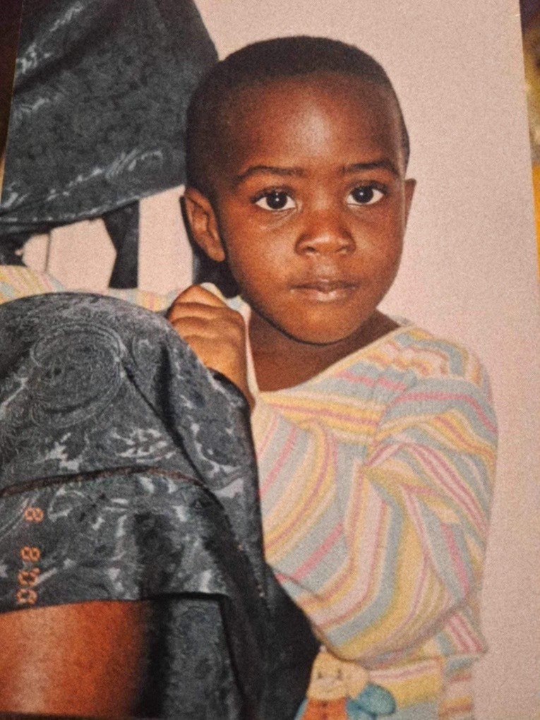 Child holding on to parent