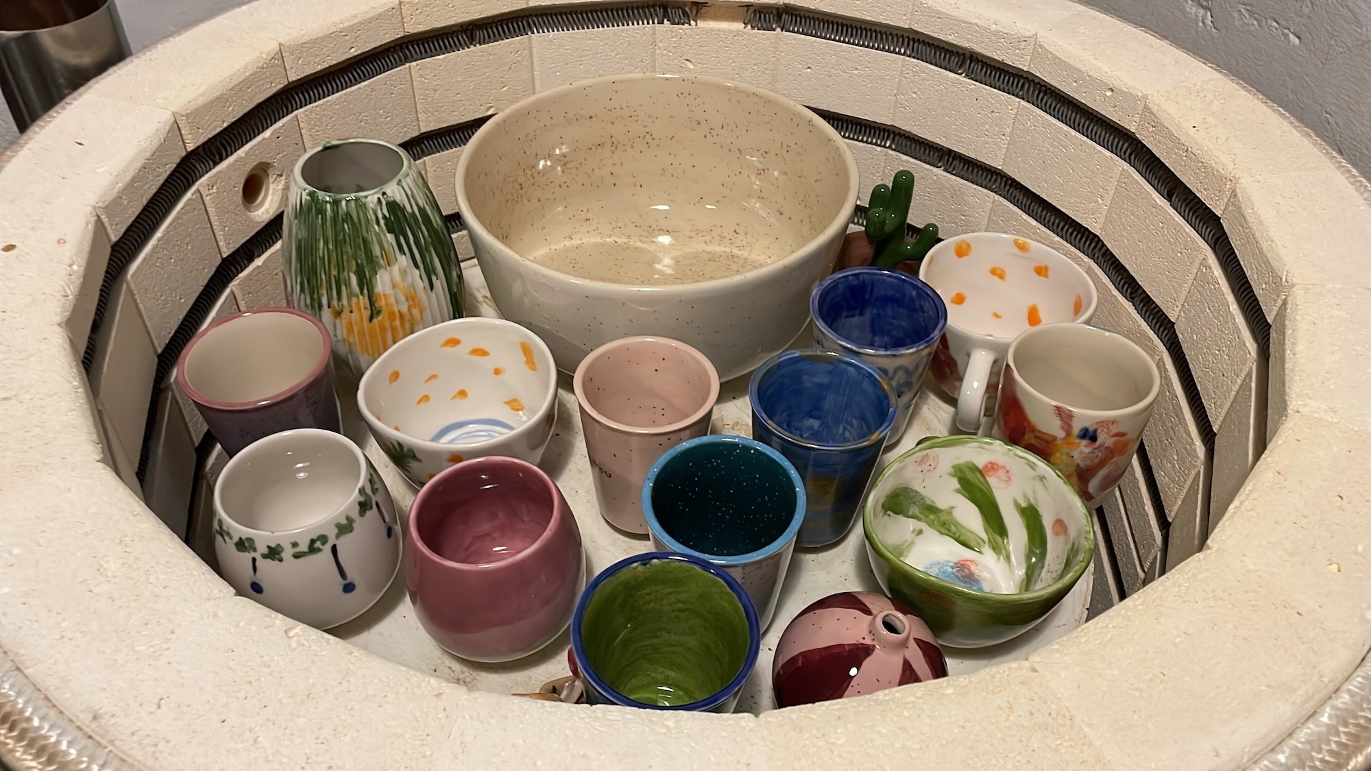 Opening the pottery kiln at Lerværk to reveal beautiful handmade ceramics from our latest workshop