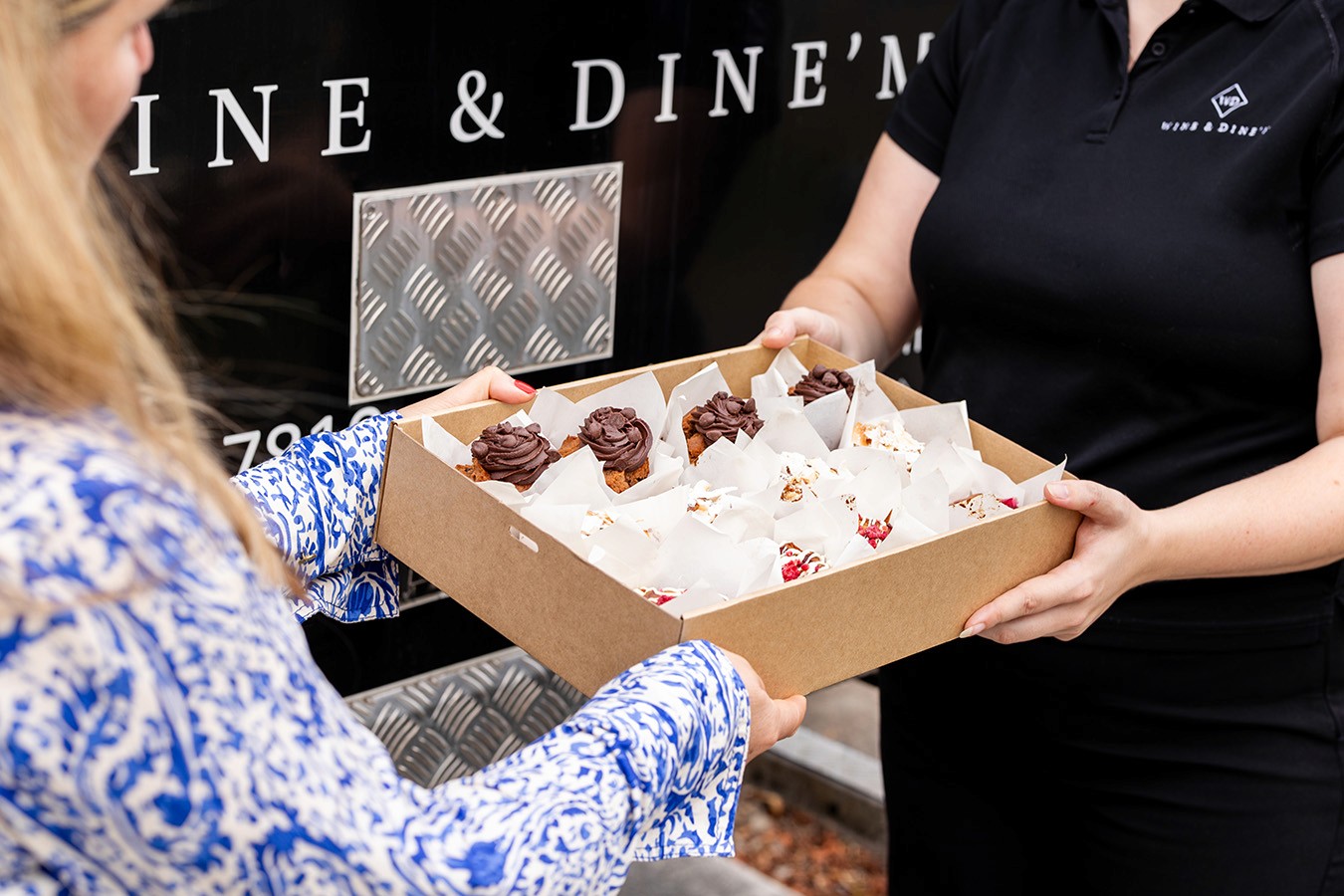 Delivering freshly baked muffins to a customer