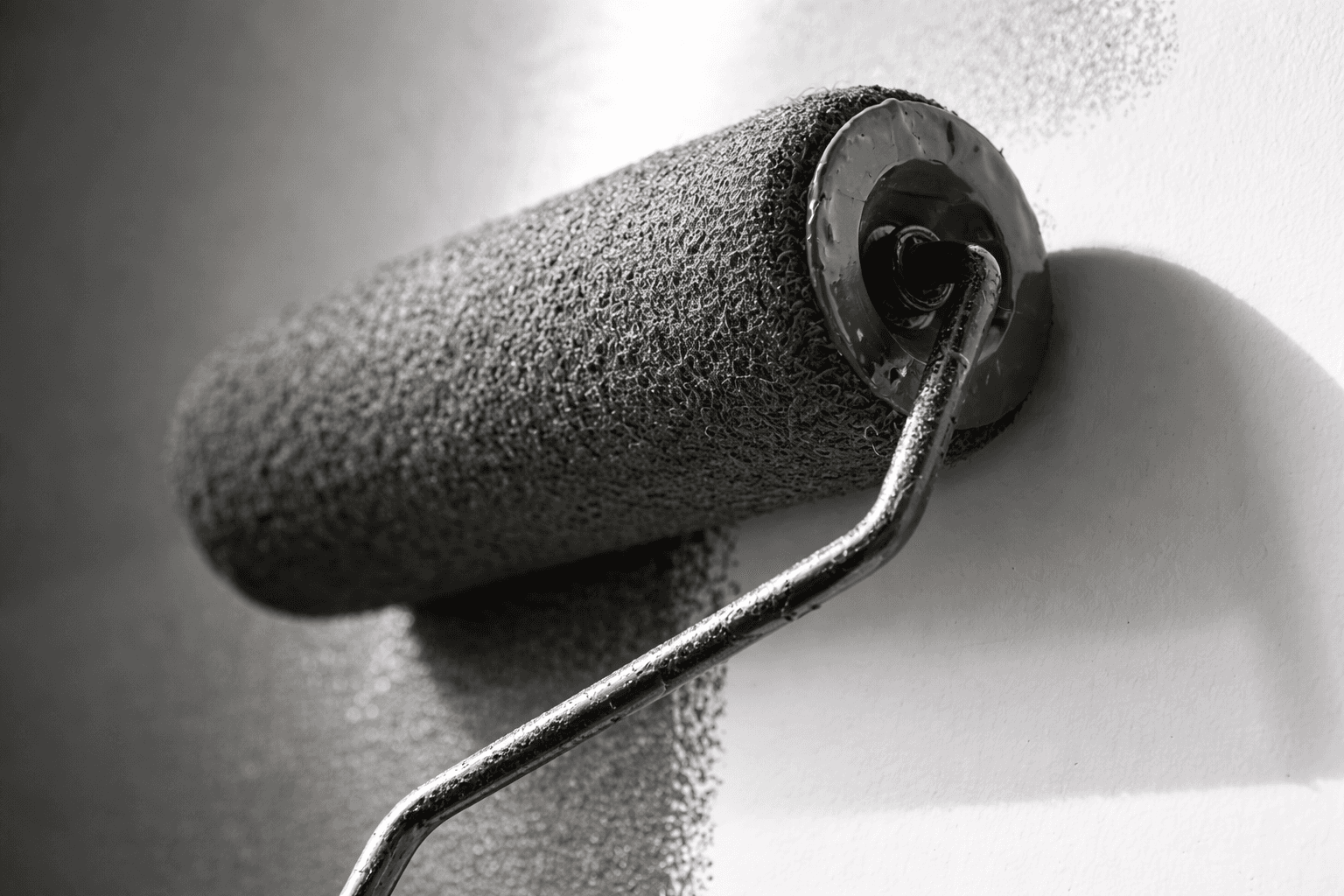 a large brick house with a lawn and hedges in front of it with Moseley Old Hall in the background