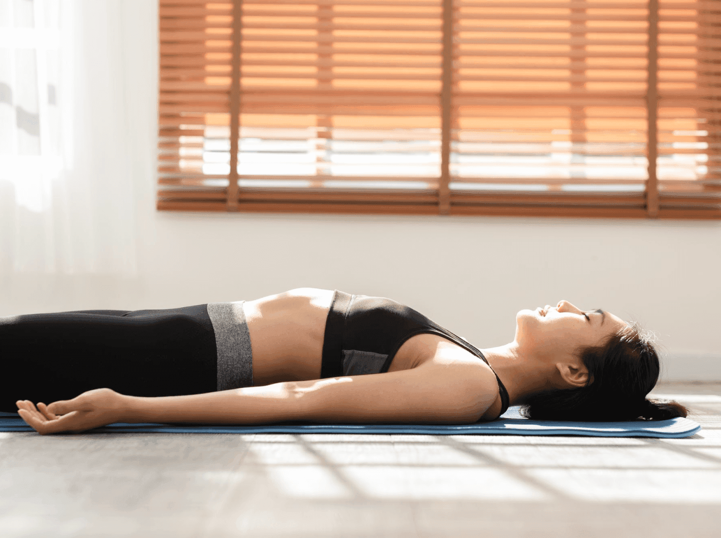 A woman partaking in yoga nidra