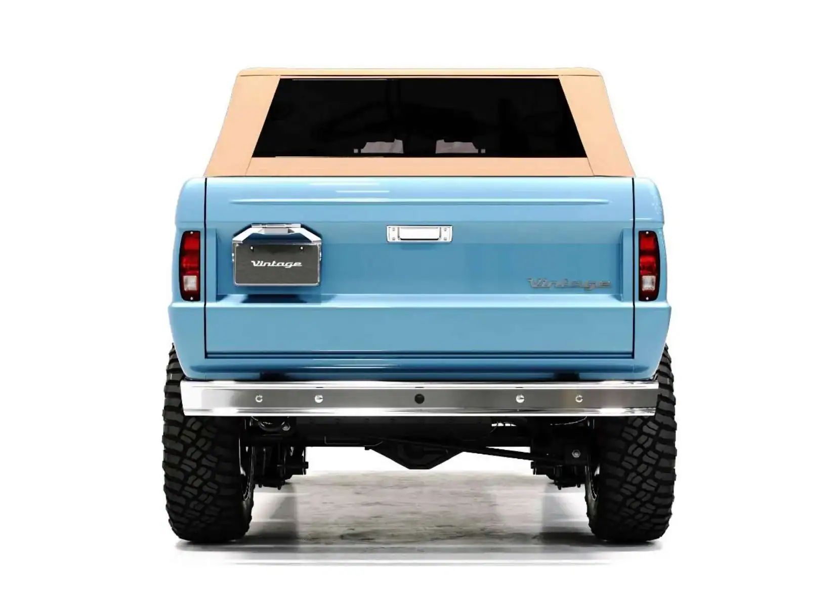 a person swimming in the water with grass