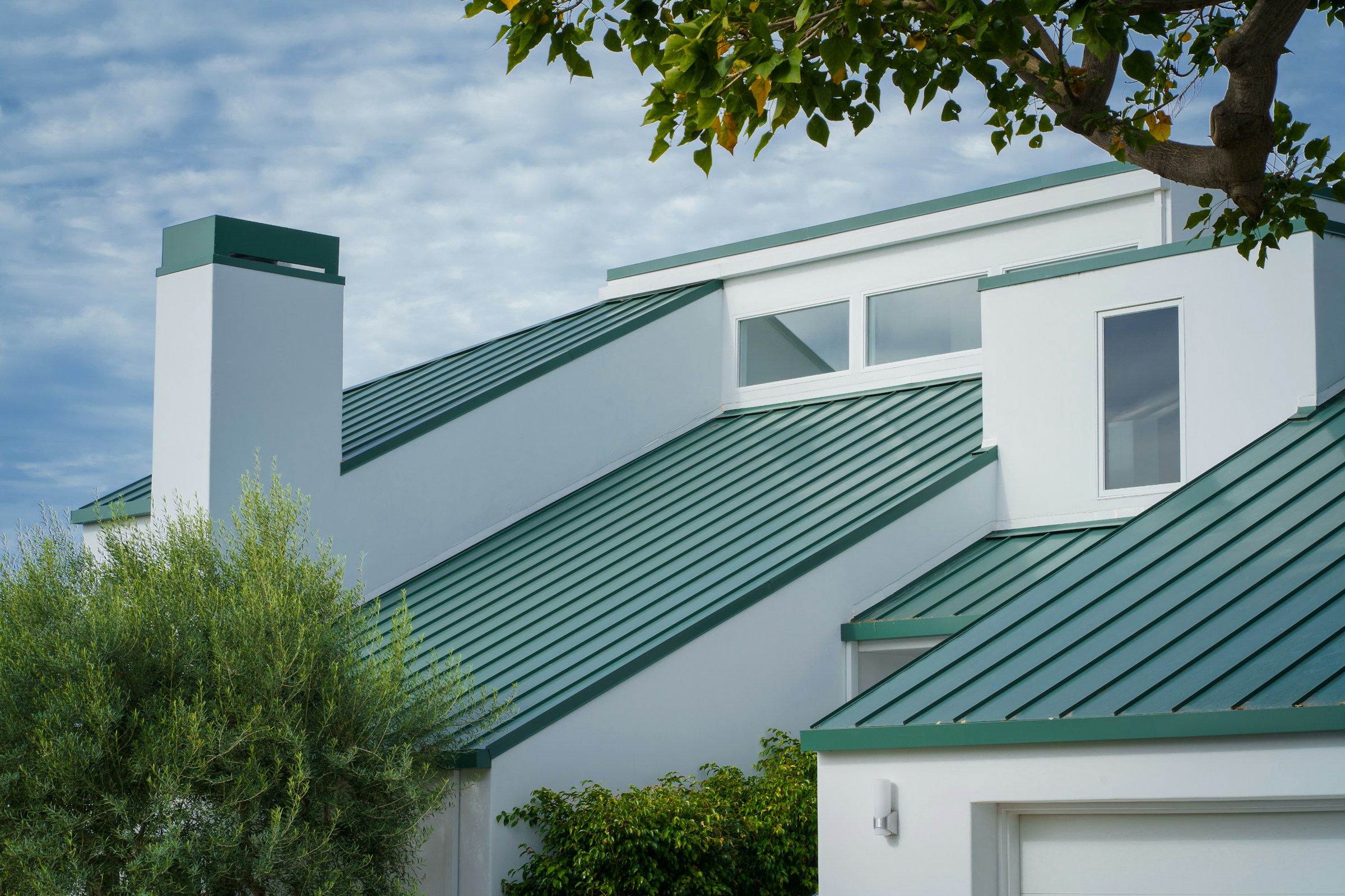Home finished with a standing seam metal roof