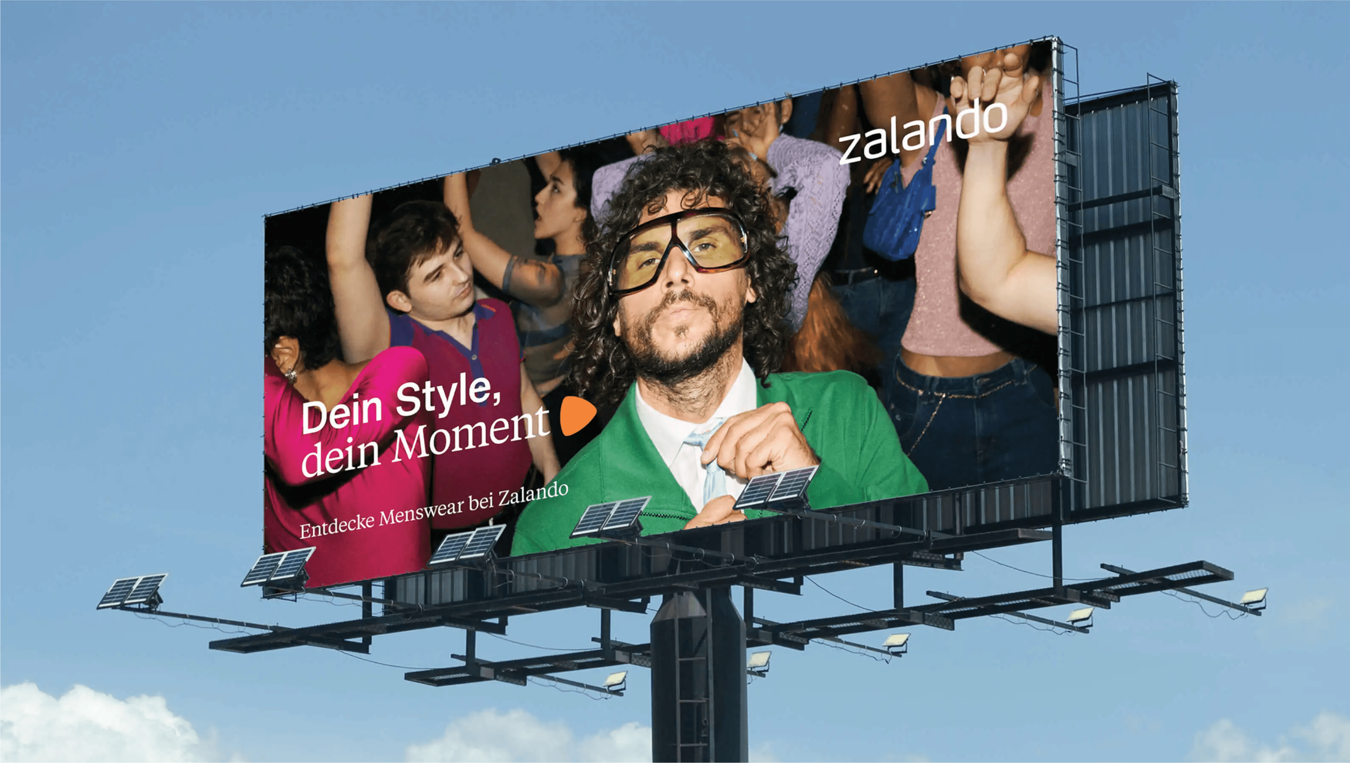 Chair with champagne and glasses by window.