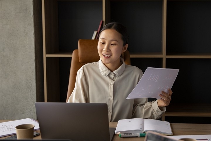 Company secretary reviewing corporate documents