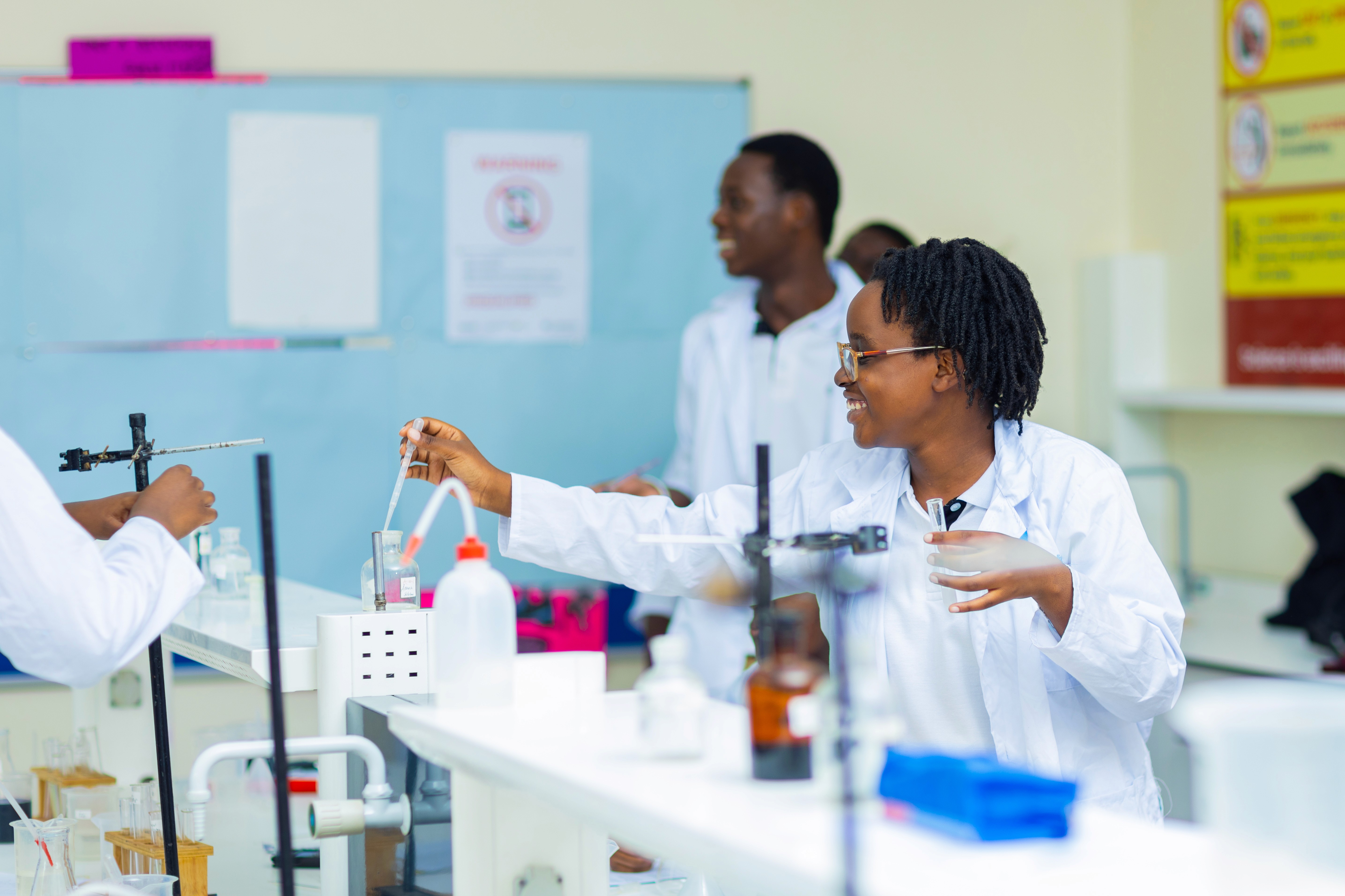 A student stands with a backpack on, ready for school