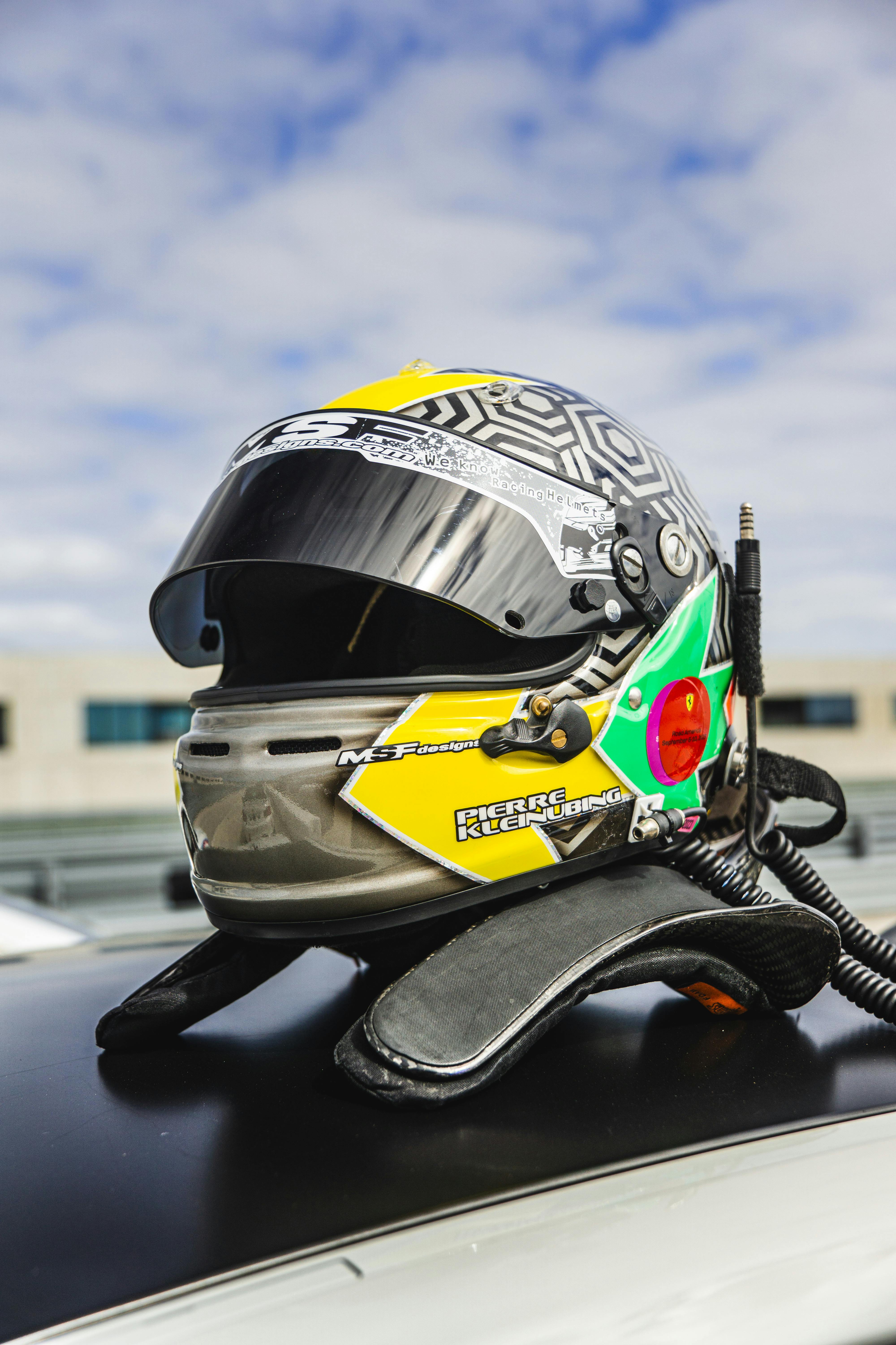 Racing helmet sitting on a table