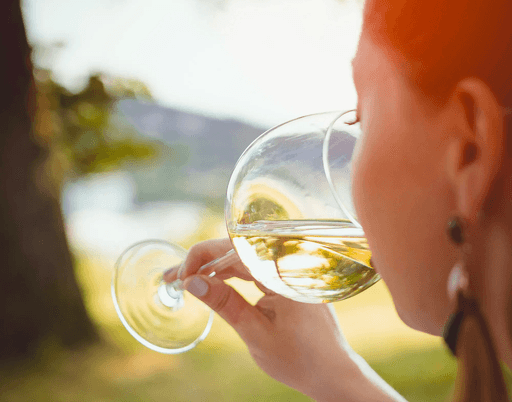 boy in white crew neck shirt holding clear glass bubble maker