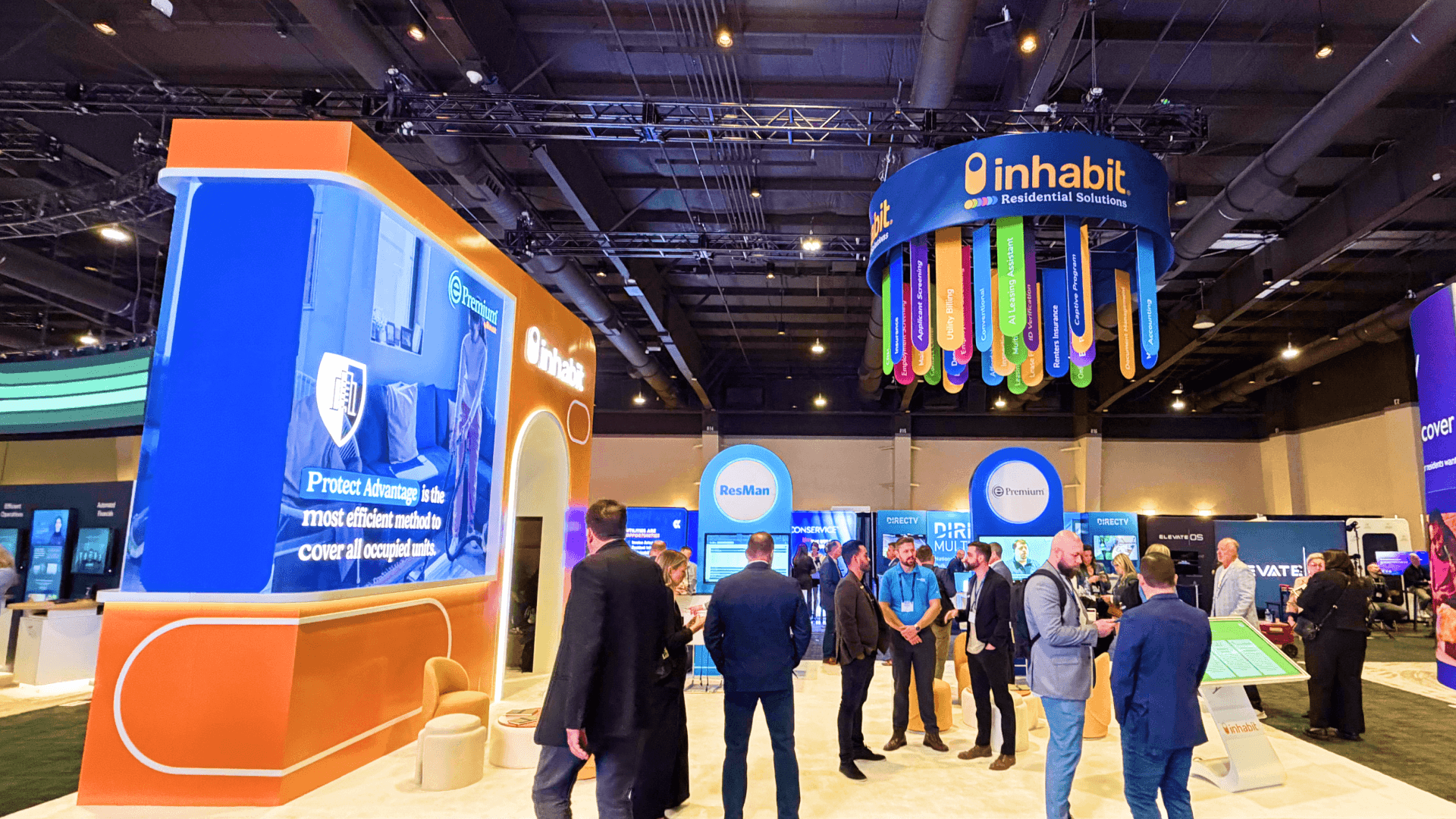 casino technology trade show booth featuring multi-screen demo walls and structured engagement zones for gaming brands