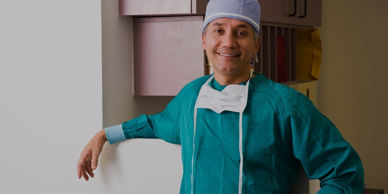 Portrait of doctor in scrubs smiling