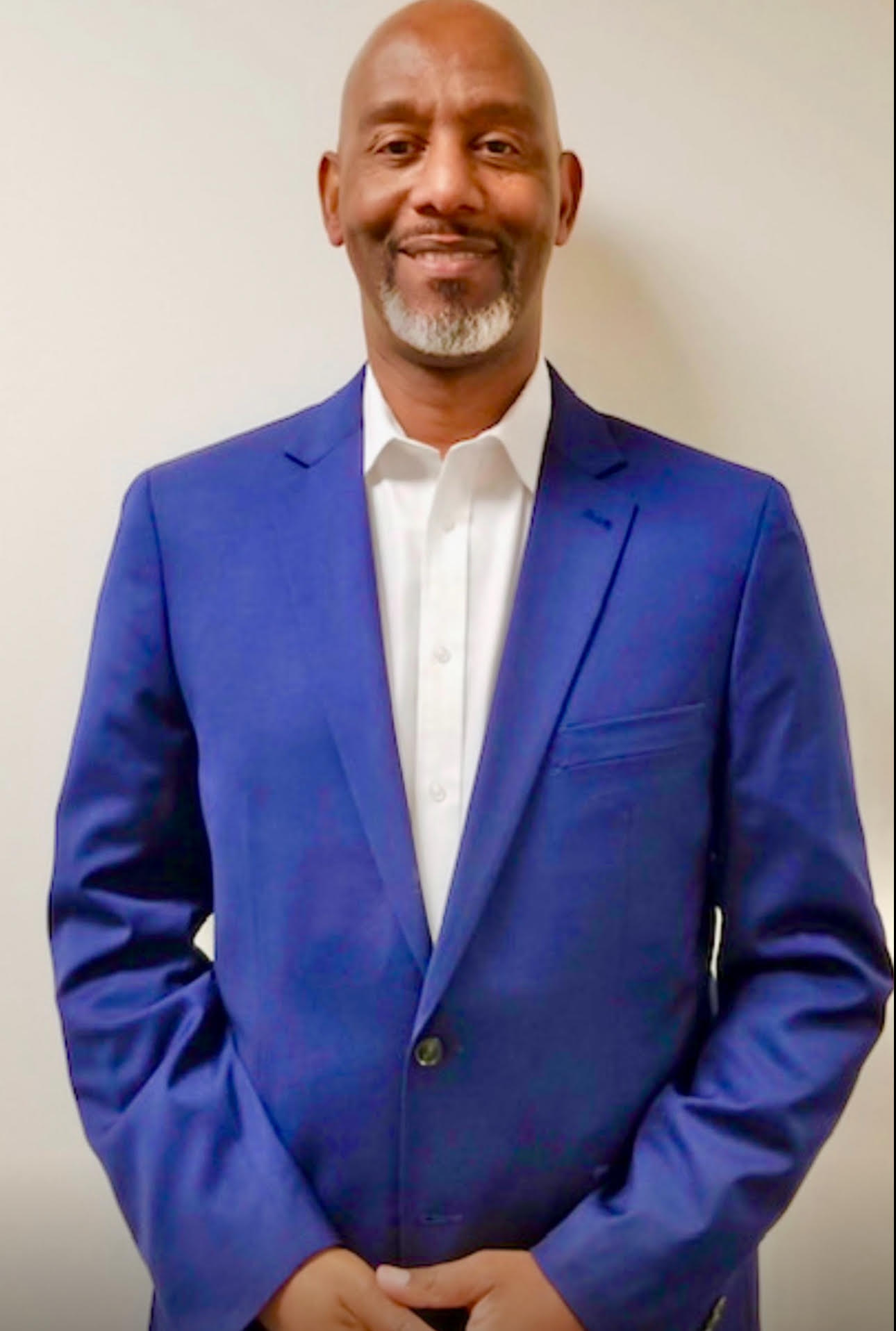 selective focus bokeh photography of man with broad smile