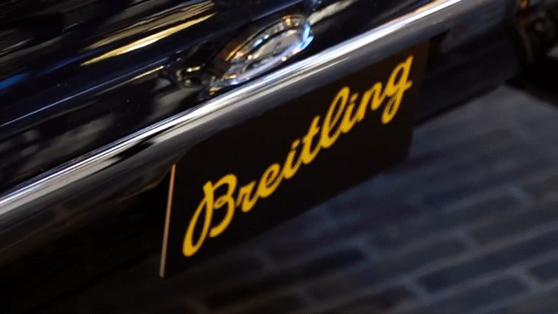 Bride and groom walking on street at night