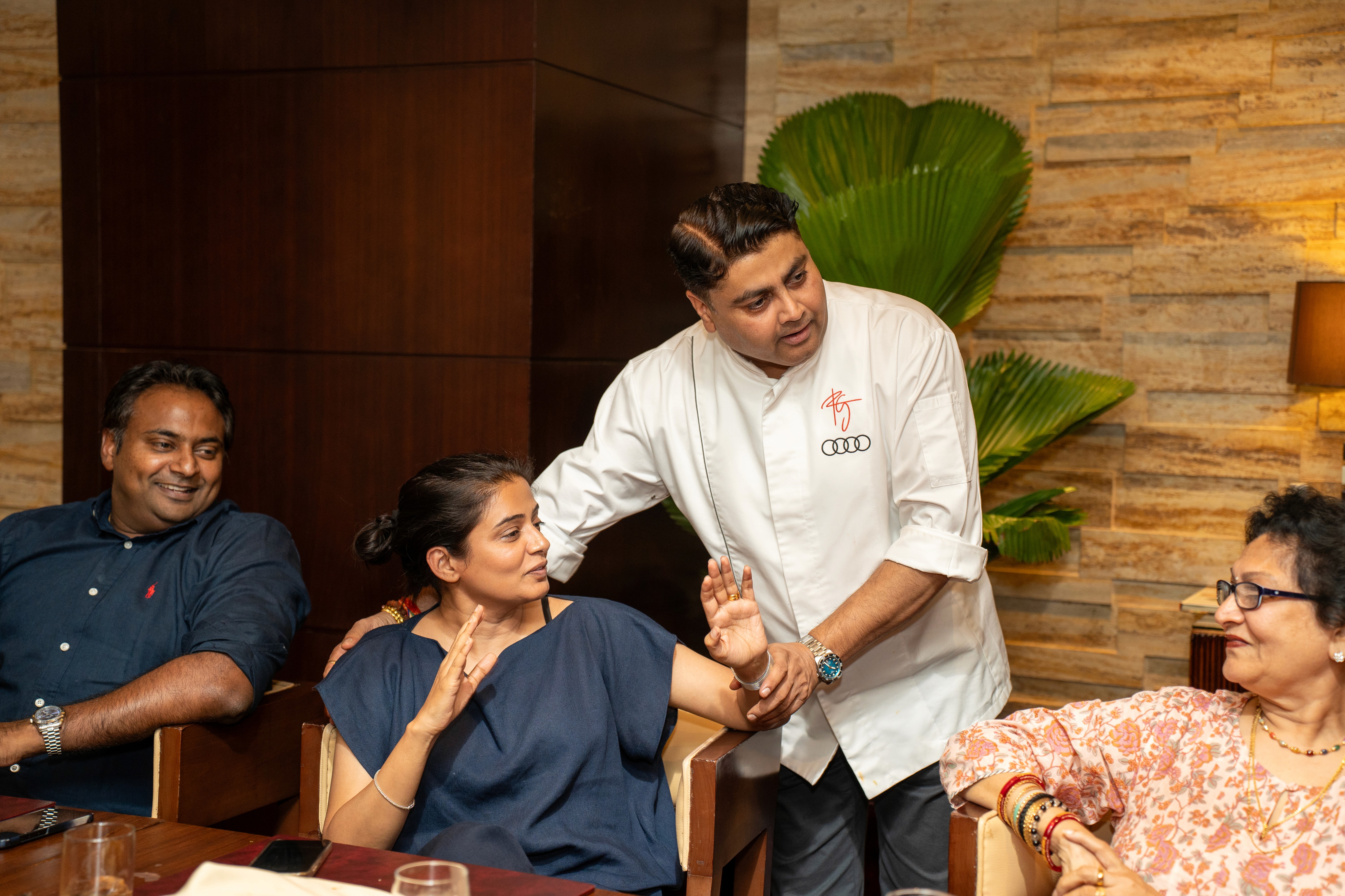 Streetside billboard with flyposters of the Batch.Works brand and illustrations