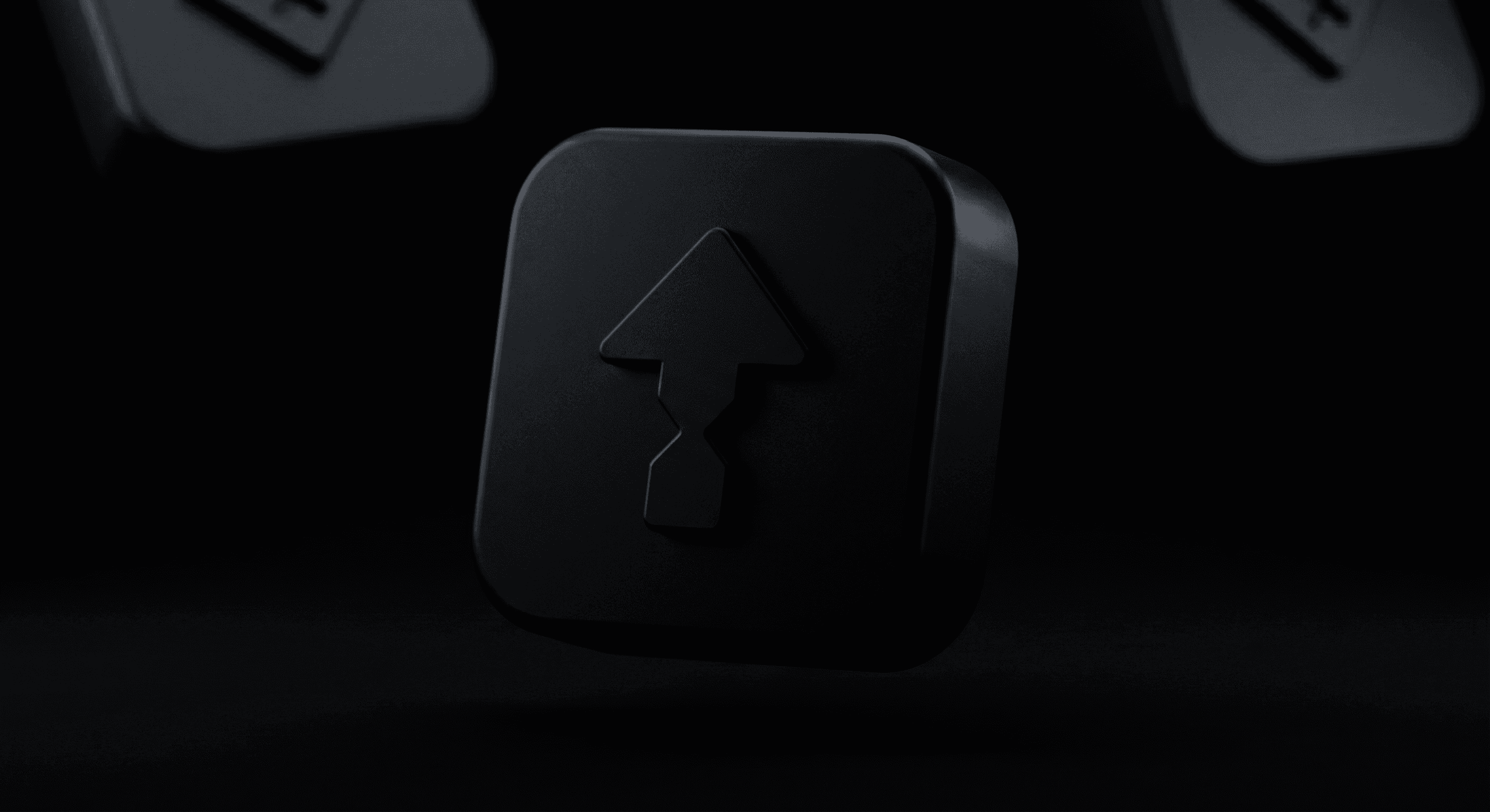 a close up of a black object with a black background