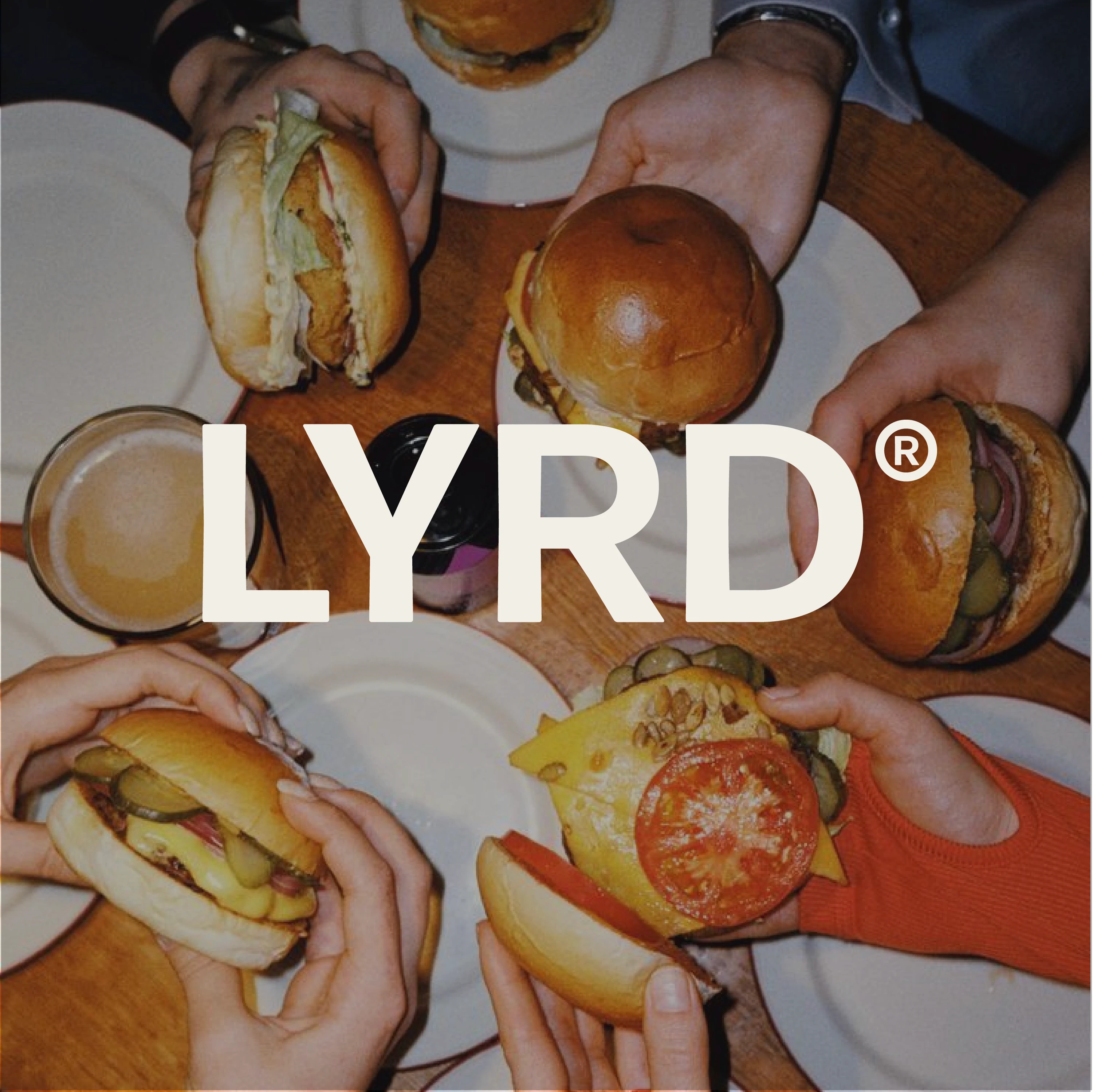 LYRD man eating a burger