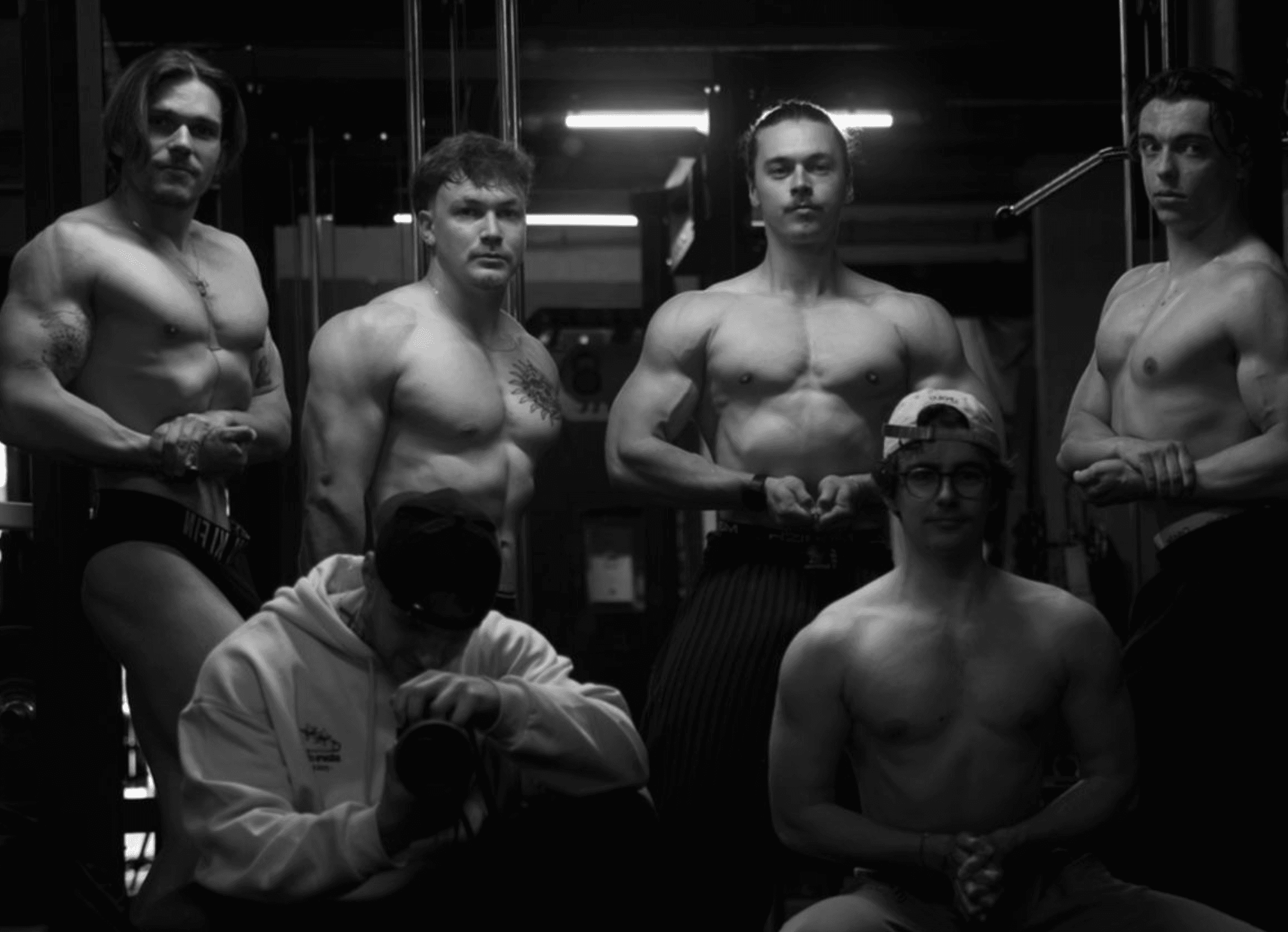 woman in black tank top and red shorts doing exercise