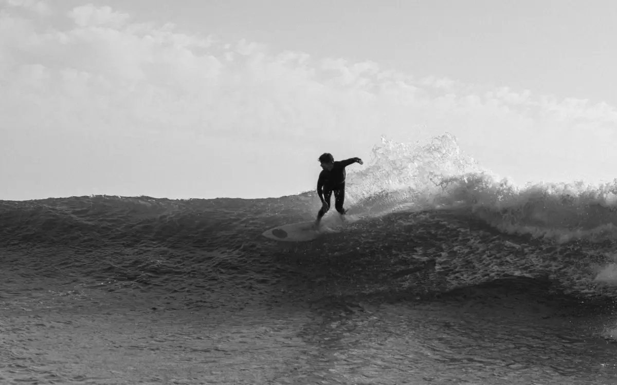 man riding a big wave
