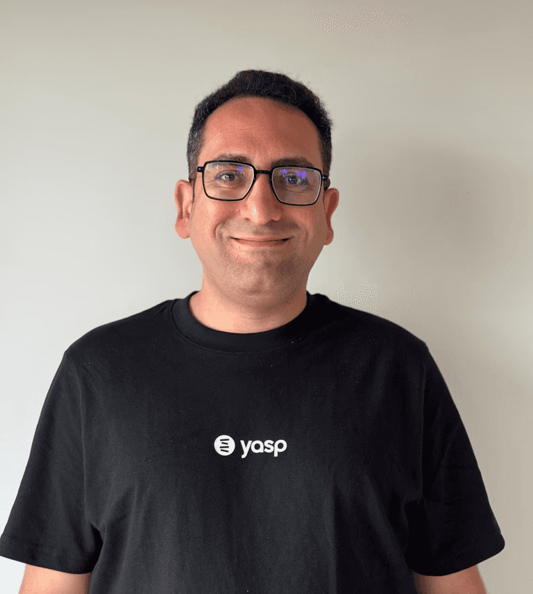 Woman wears ornate traditional mongolian headdress and attire.