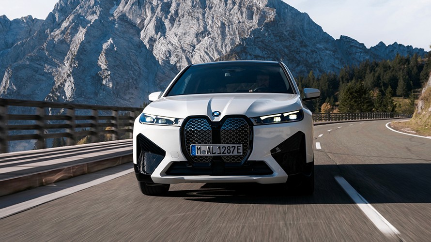 Group of men standing with Sufboard