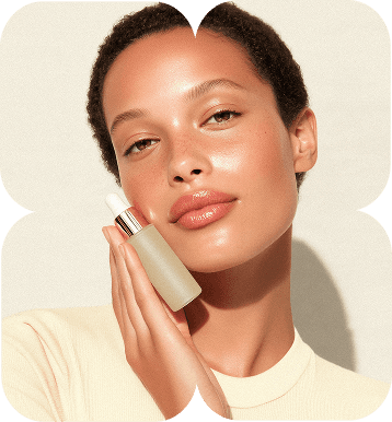 a glamarous model showing some makeup product wearing a white shirt