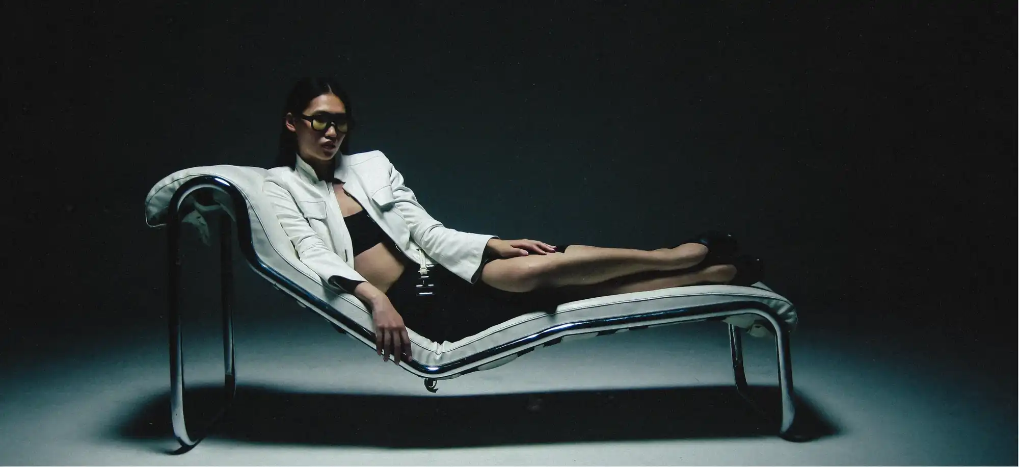 Open book with sunlight and shadows highlighting editorial typography design