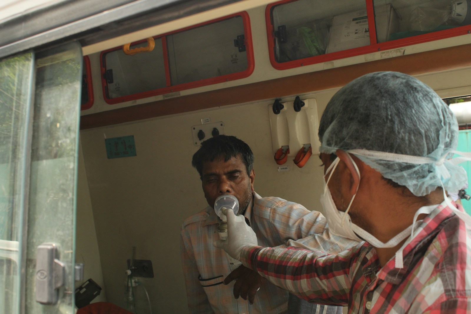 Medical staff attending to a patient in a hospital setting