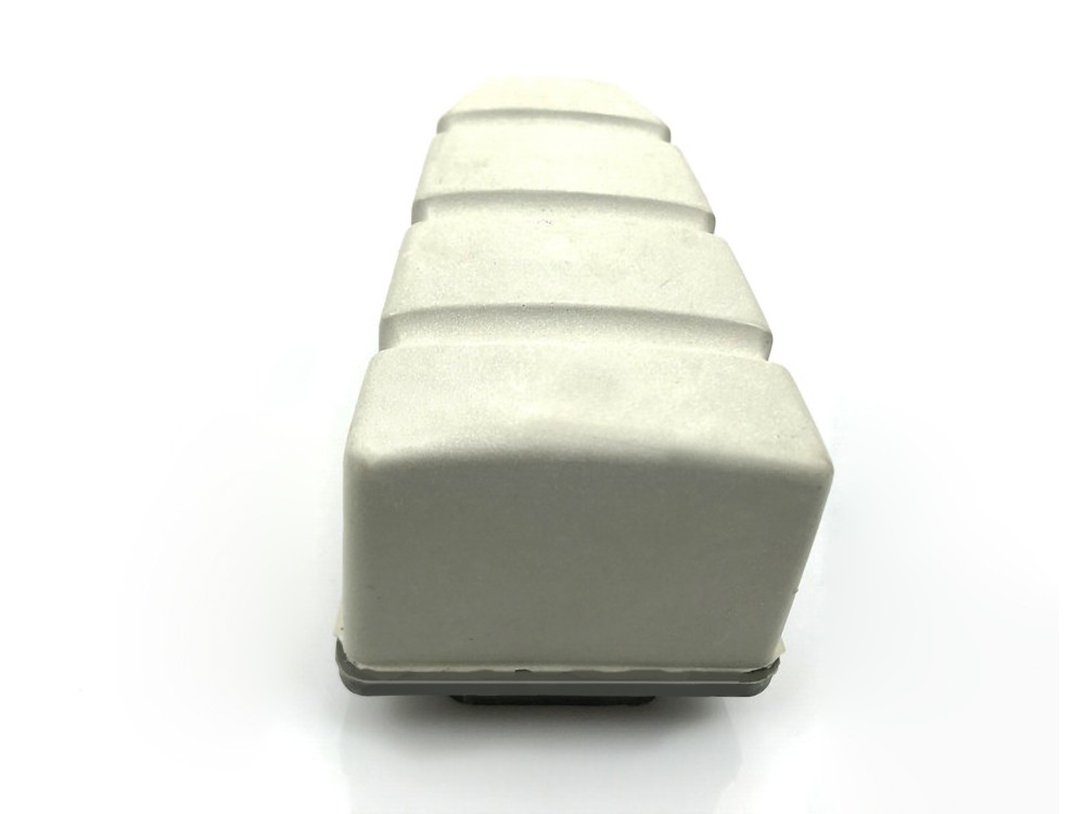 A single resin bond diamond fickert in white, captured from the front, showing its layered structure.