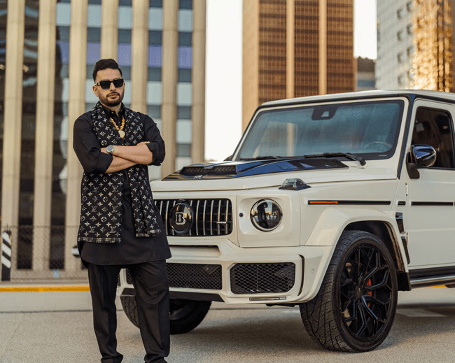 a man holding a cocktail