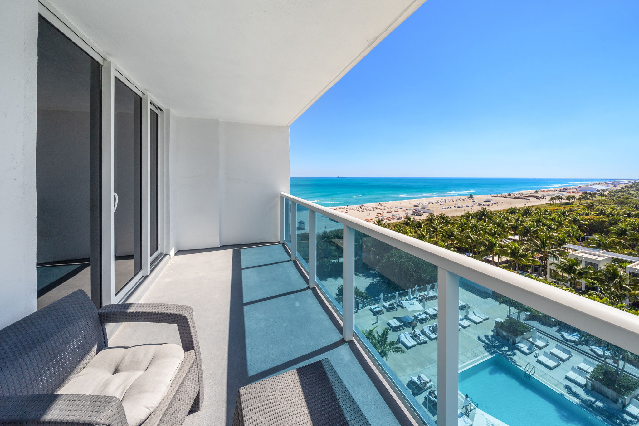 flat lay shot of spa amenities by the bathtub