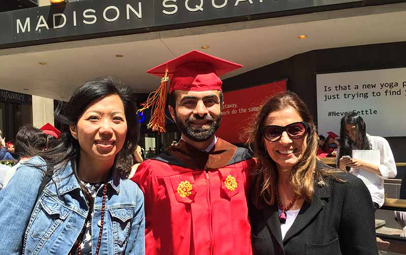 student graduation in a red gown