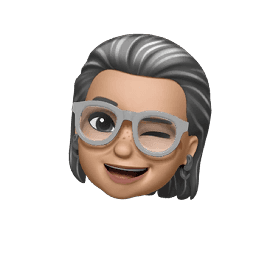 Weiblicher Bitmoji mit langen grauen Haaren und Brille.