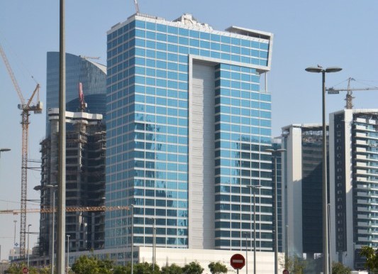 Street-level view of Clover Bay Tower, perfectly located for businesses in the heart of Dubai.