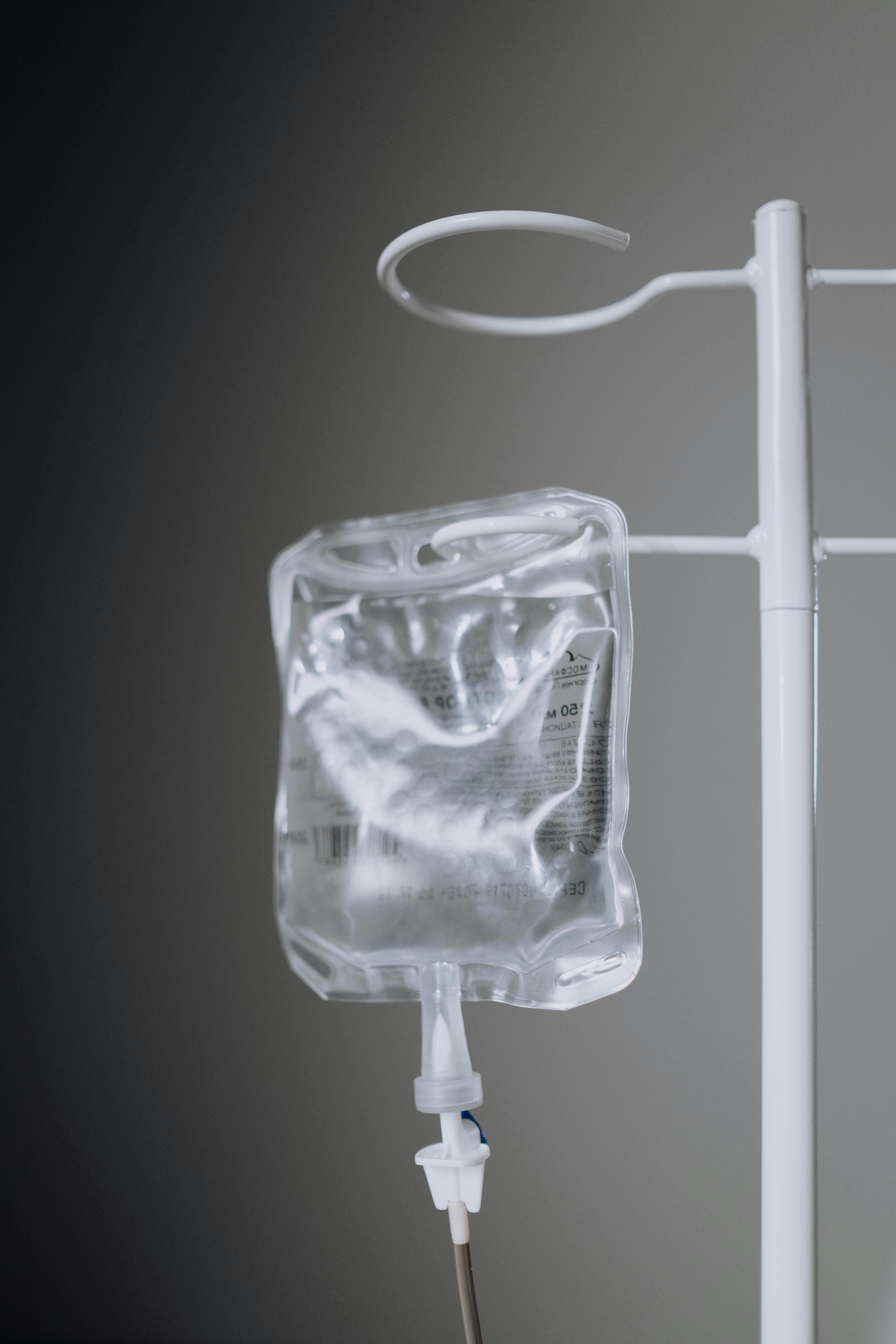a-close-up-view-of-an-iv-fluid-bag-hanging-on-a-pole,-ideal-for-healthcare-conce - cottonbro-studio (pexels)