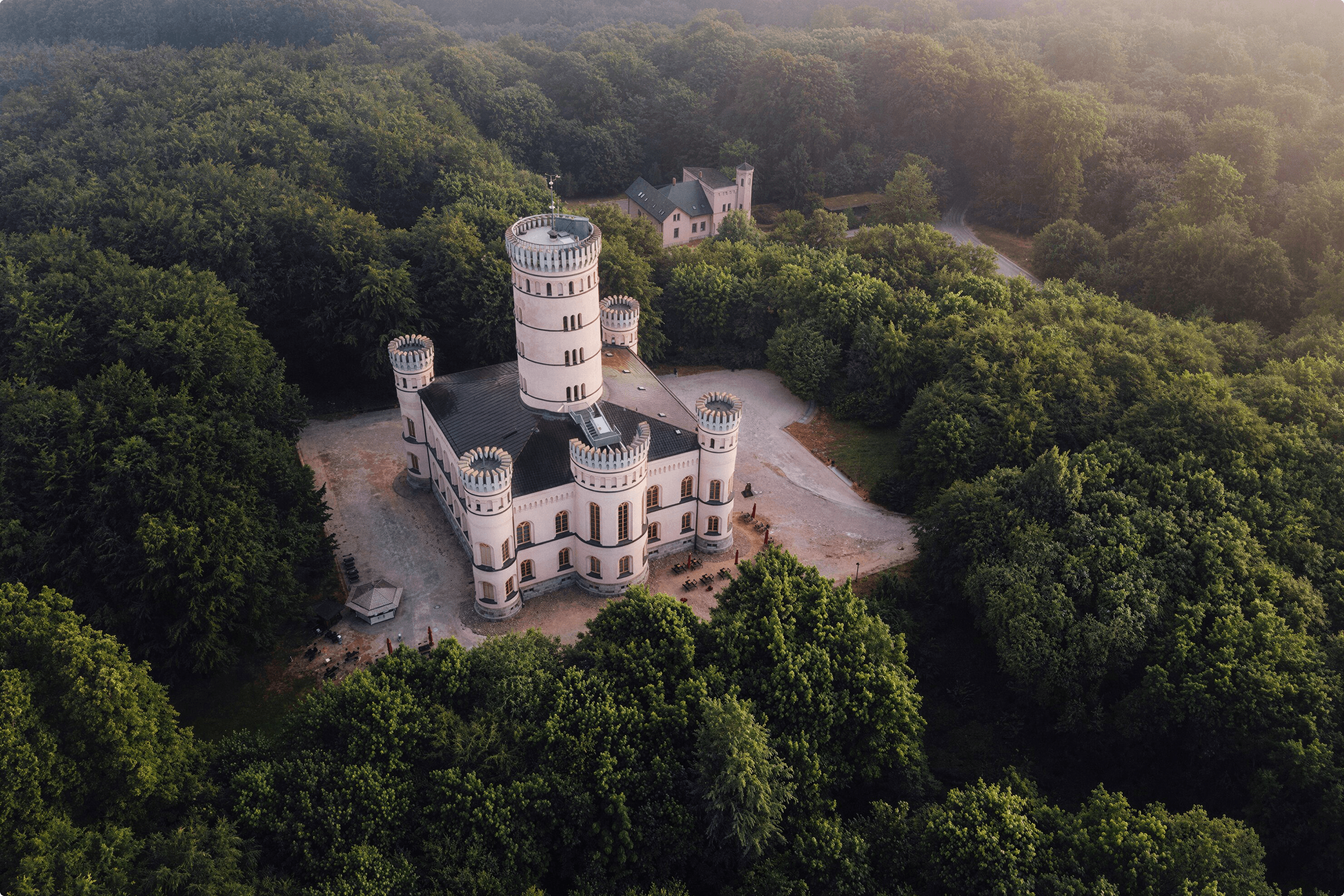 Castle in an ethereal forest setting.