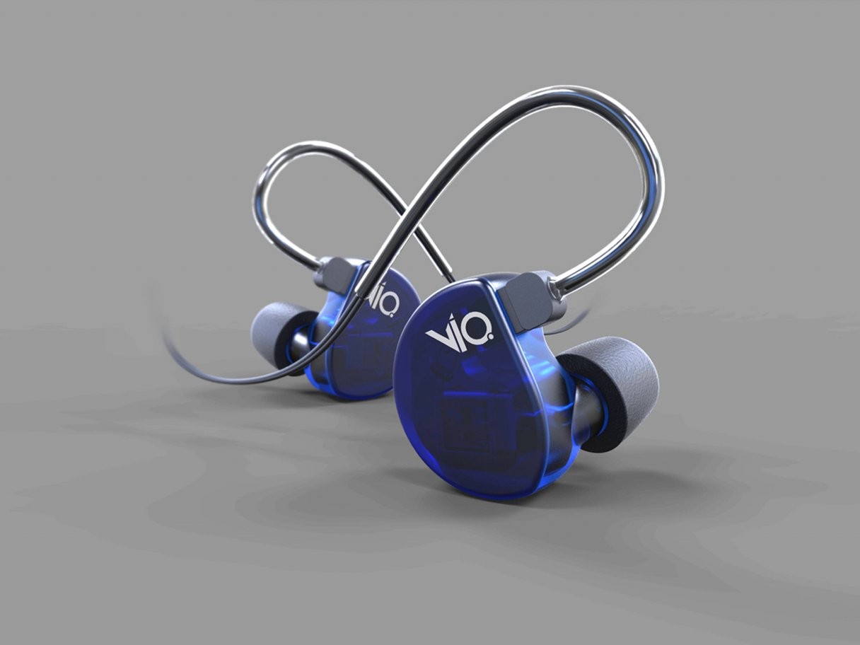 Rooftops of a coastal town with the sea in background