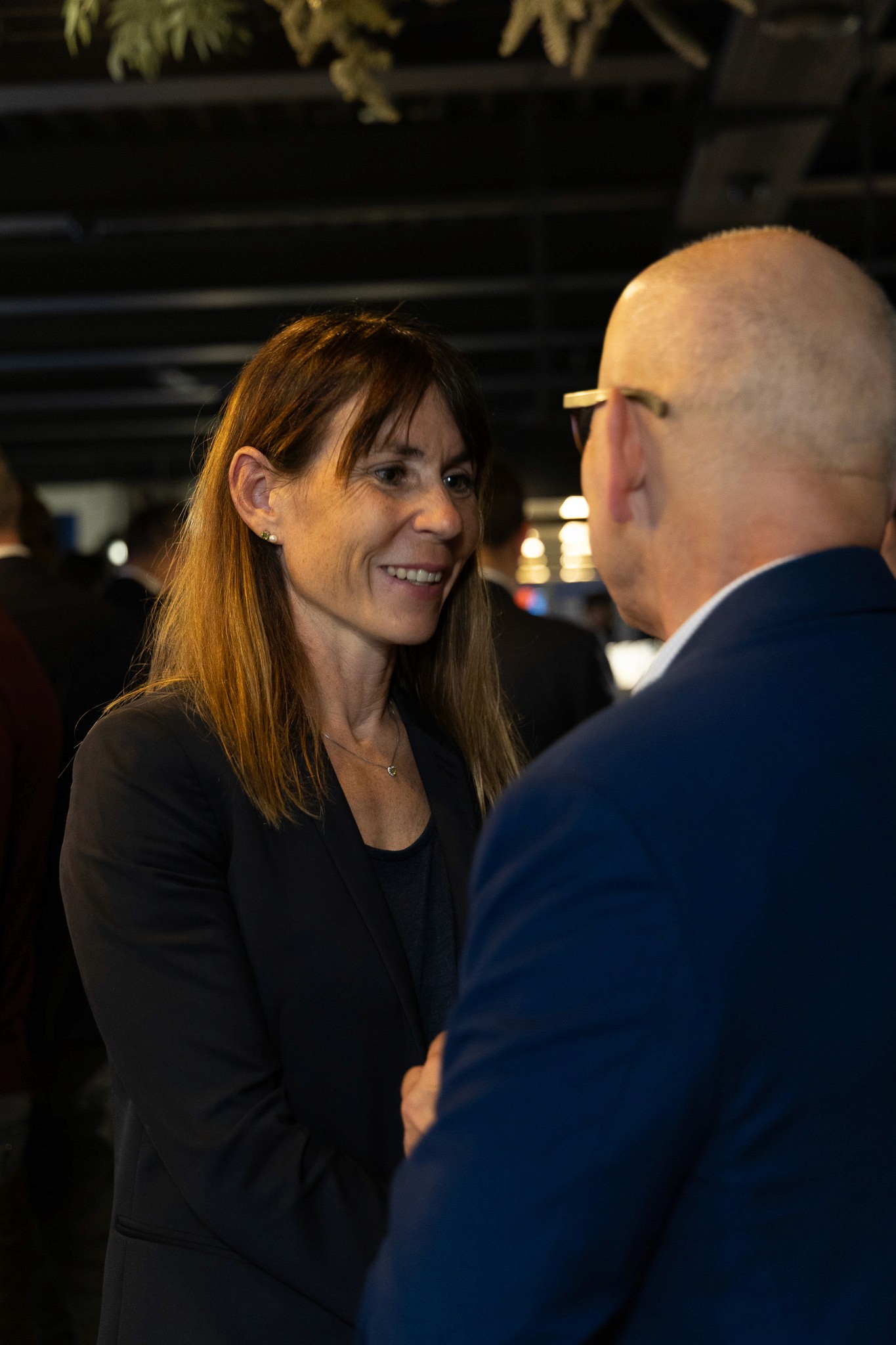 Guests networking during an evening reception at CV Summit.